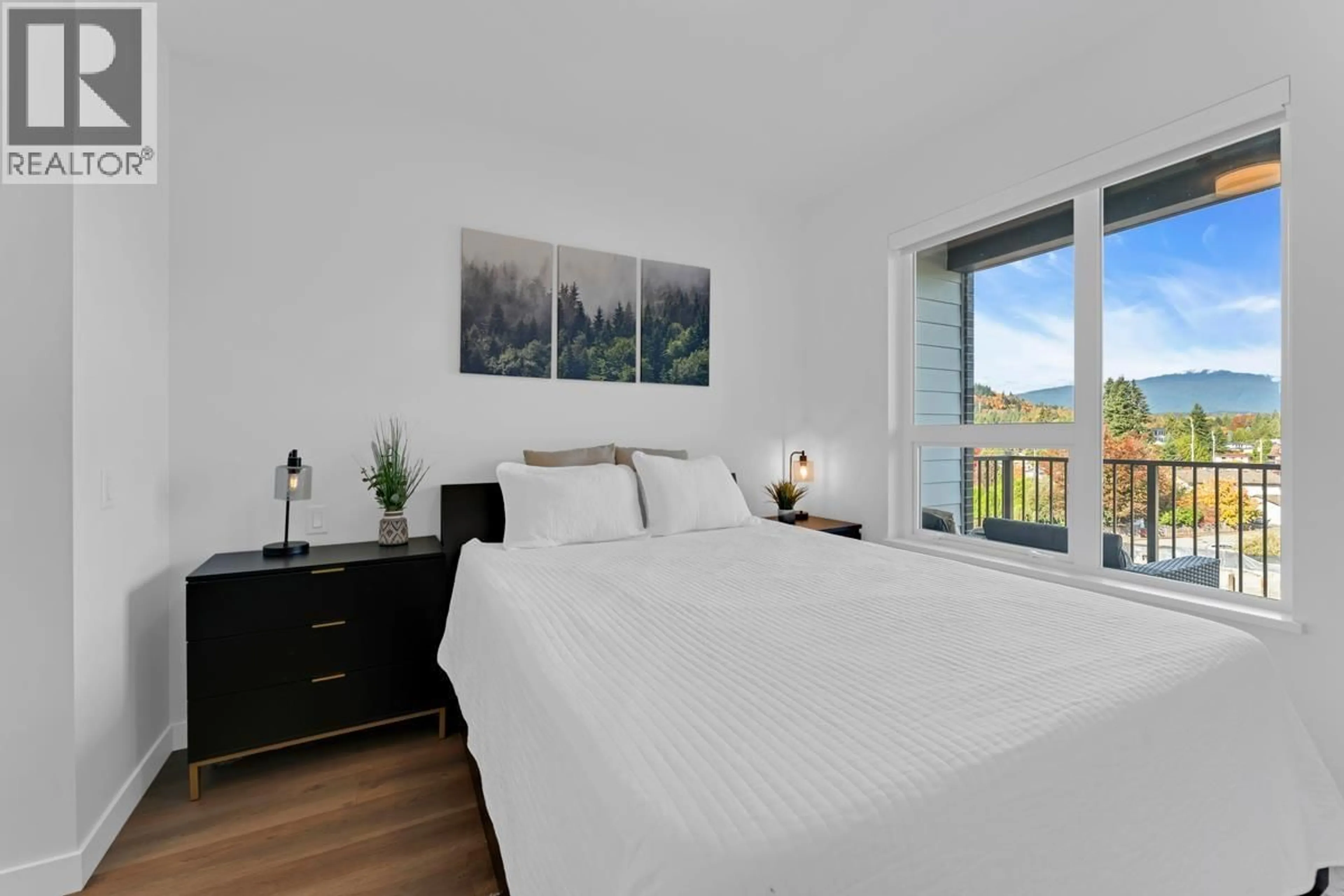 Bedroom with bed, wood/laminate floor for 409 - 648 LEA AVENUE, Coquitlam British Columbia V3J0P1