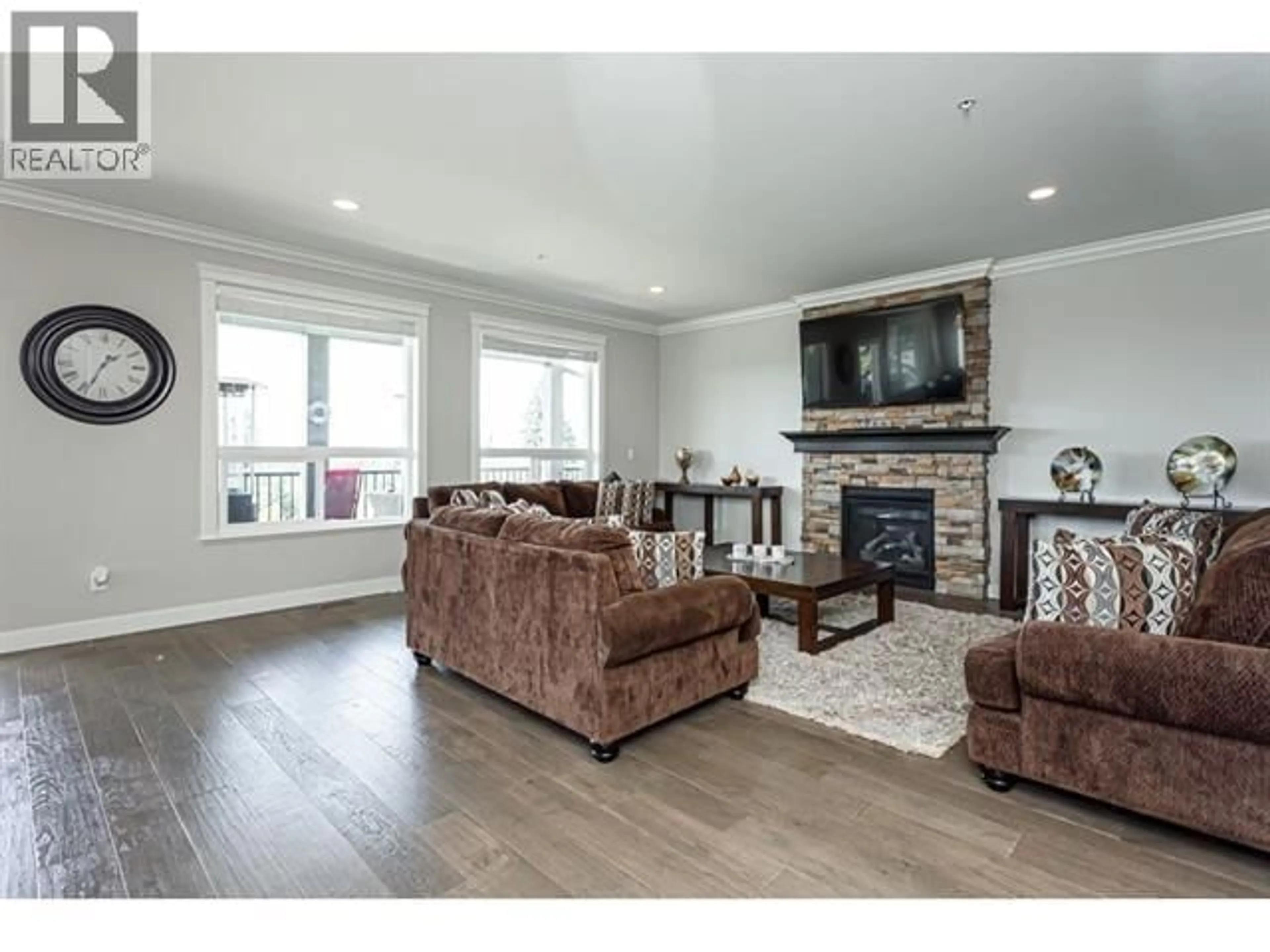 Living room with furniture, wood/laminate floor for 13305 235A STREET, Maple Ridge British Columbia V4R0E4