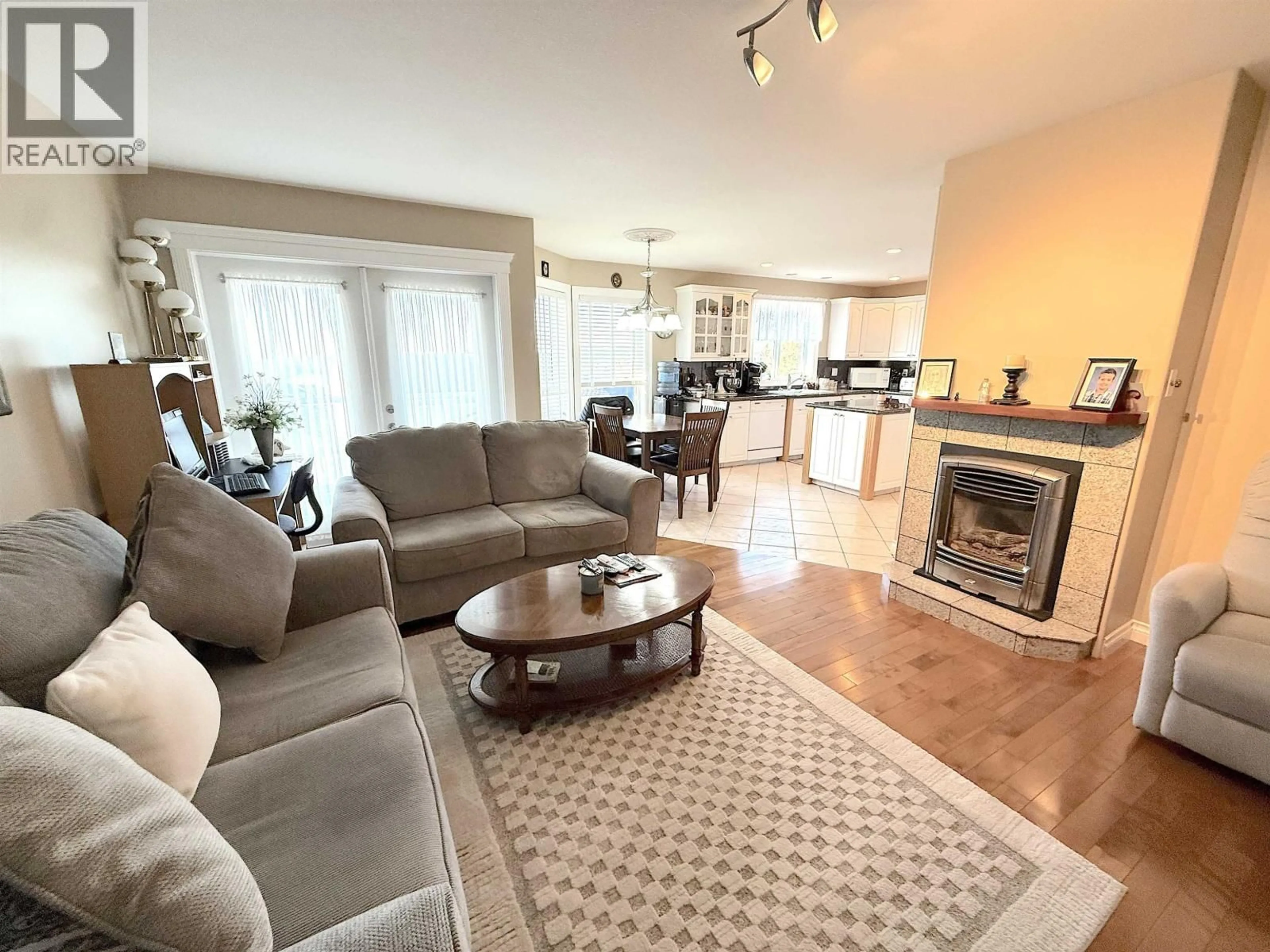 Living room with furniture, wood/laminate floor for 1041 EAGLE DRIVE, Prince Rupert British Columbia V8J4R4