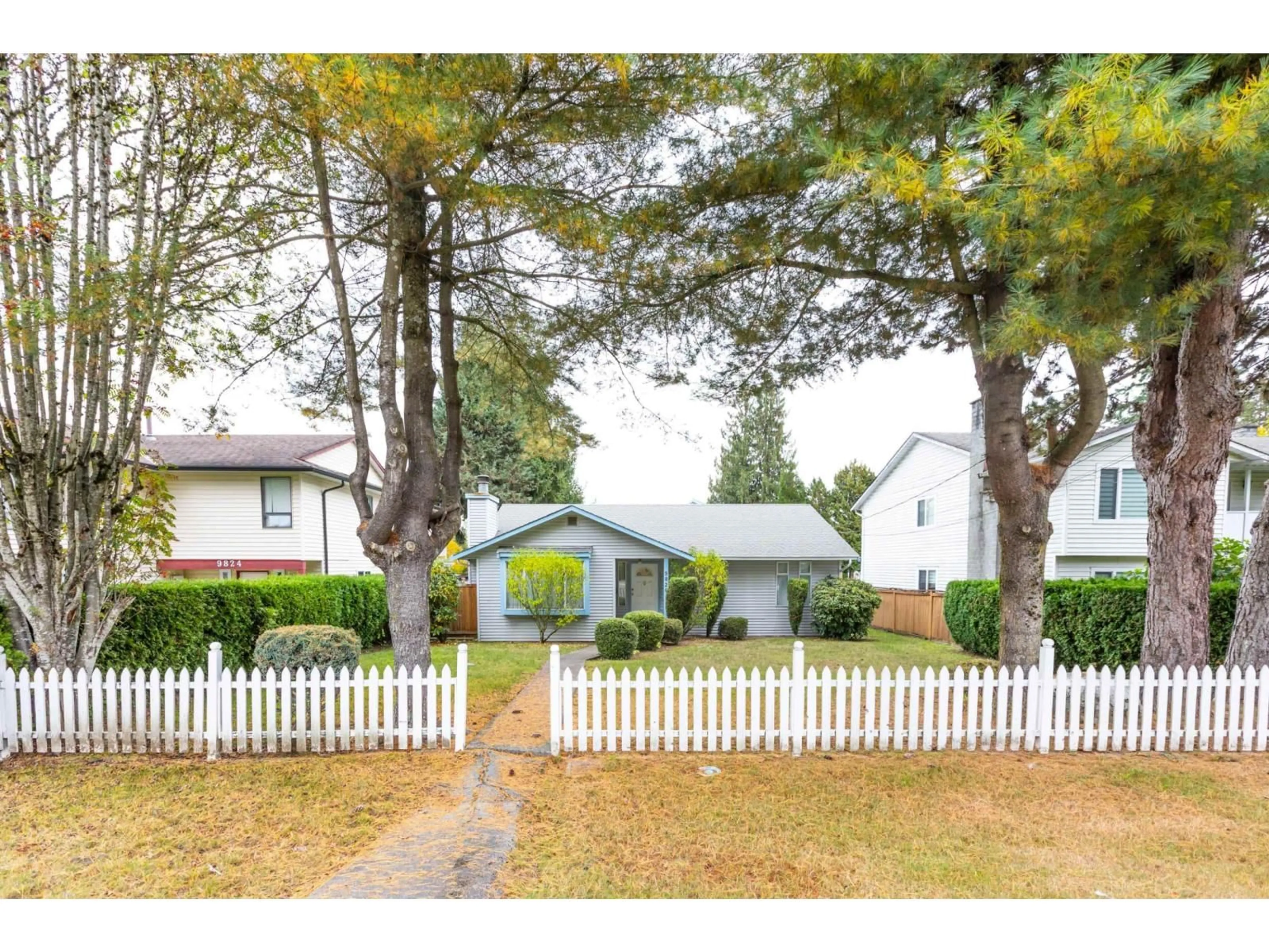 Home with vinyl exterior material, street for 9820 156 STREET, Surrey British Columbia V3R4L3