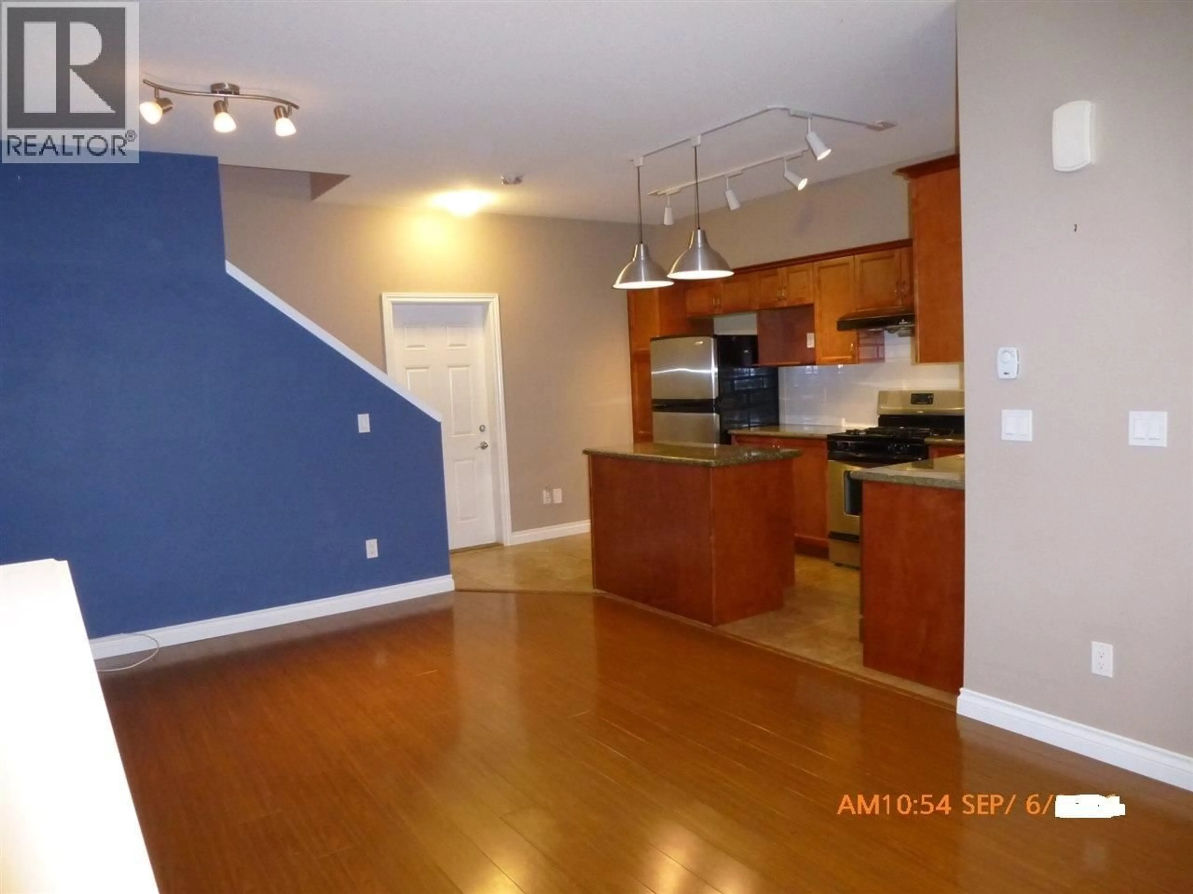 Open concept kitchen, wood/laminate floor for 8 - 11711 STEVESTON HIGHWAY, Richmond British Columbia V7A1N8