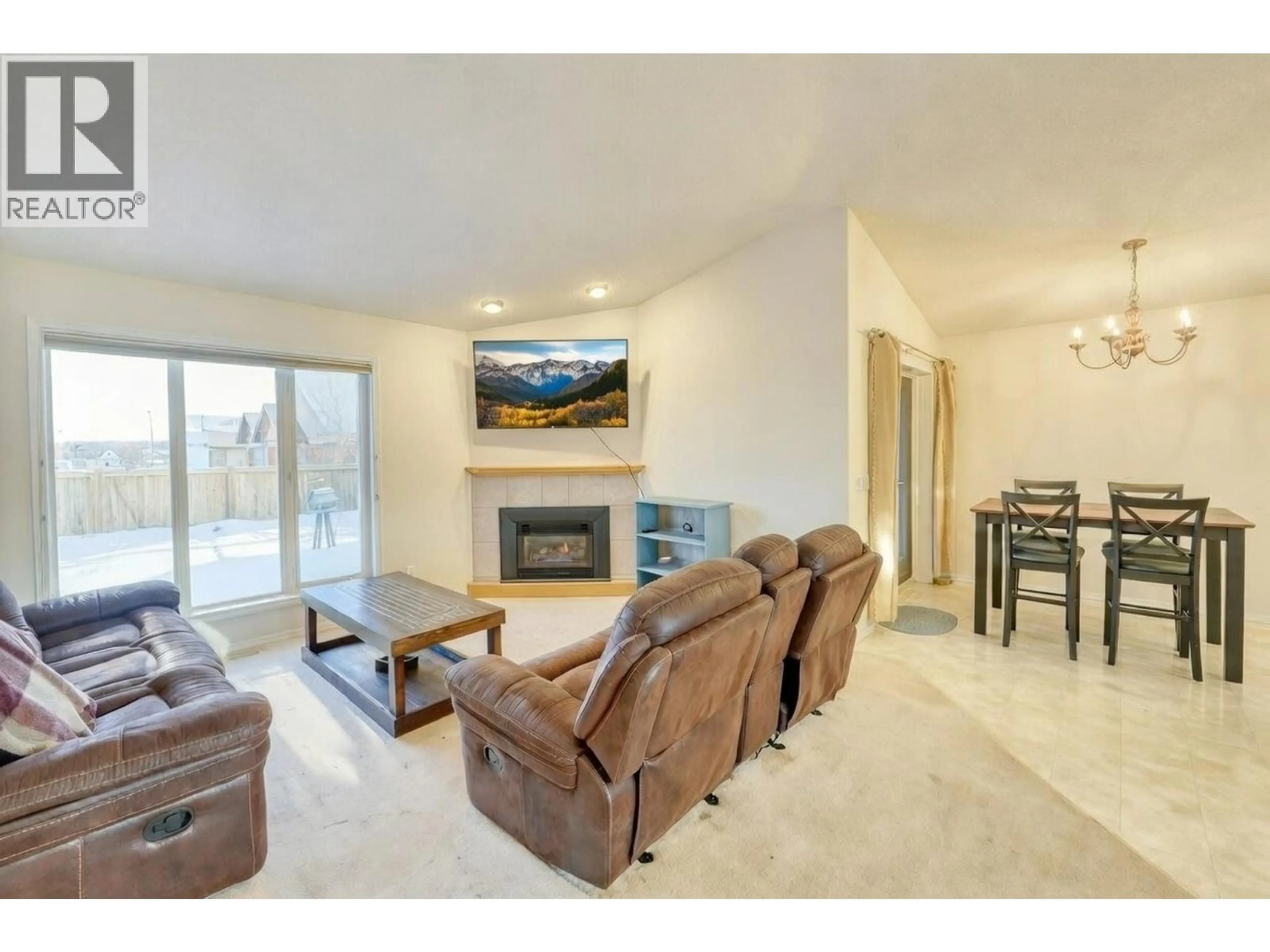 Living room with furniture, unknown for 9808 115 AVENUE, Fort St. John British Columbia V1J6R8