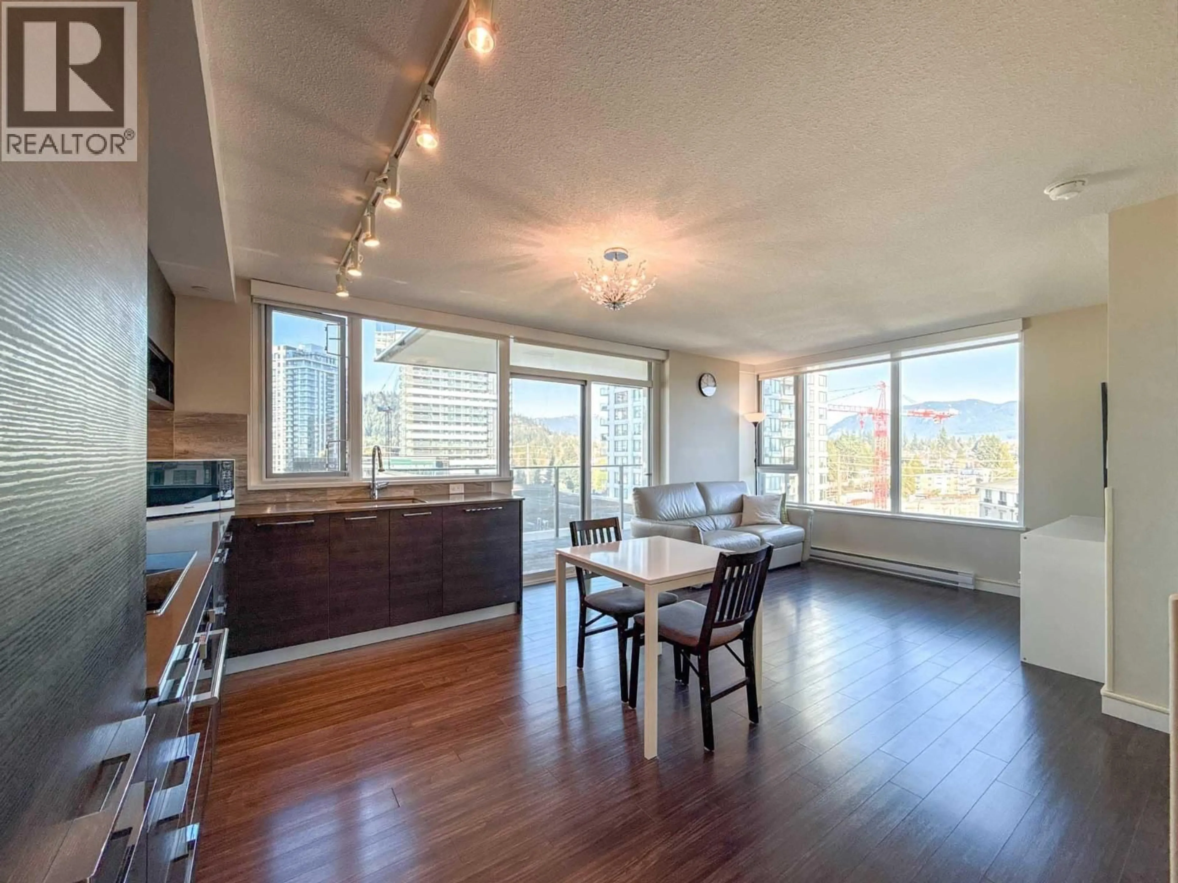 Open concept kitchen, wood/laminate floor for 804 - 570 EMERSON STREET, Coquitlam British Columbia V3J0G3