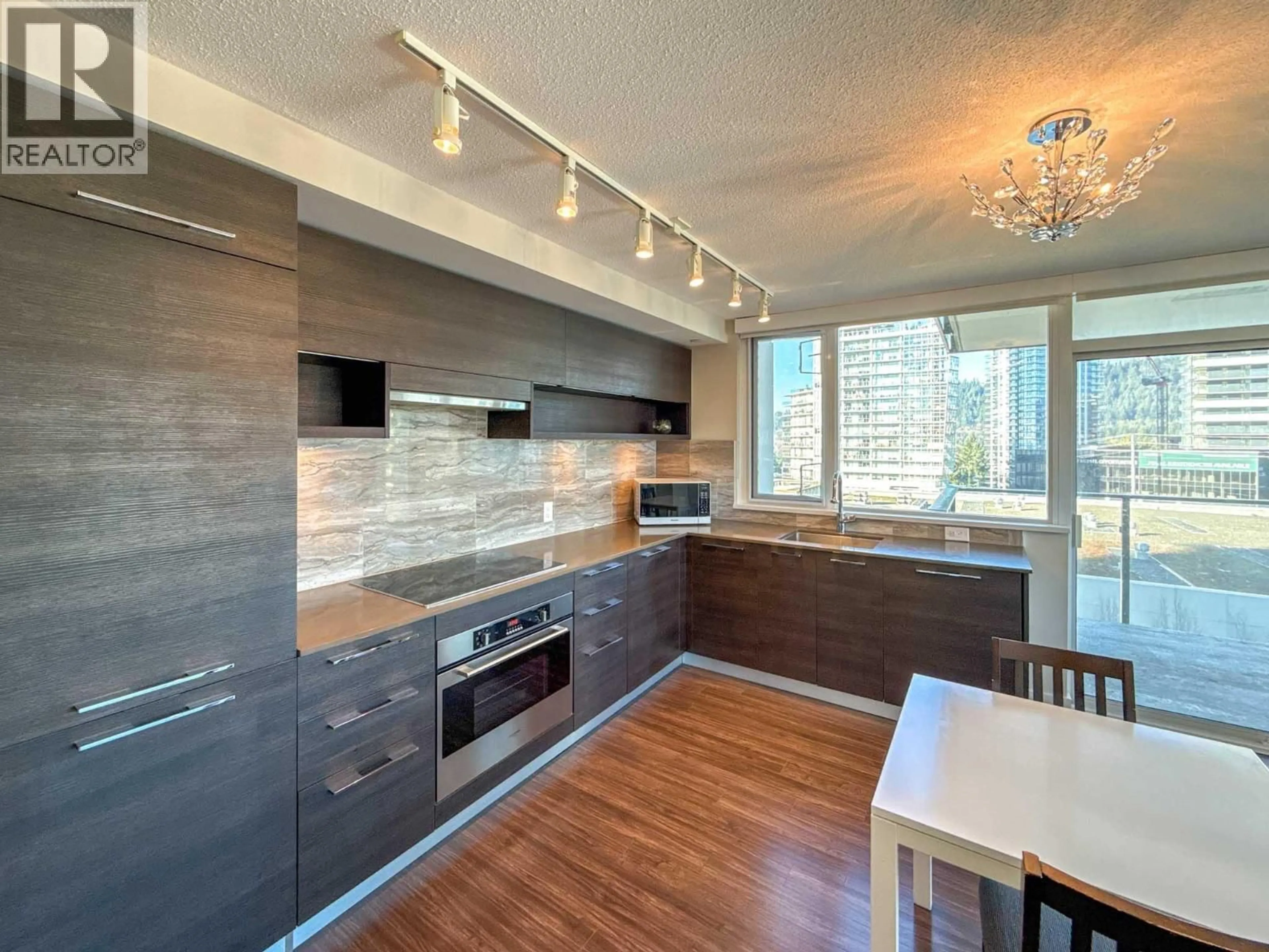 Open concept kitchen, wood/laminate floor for 804 - 570 EMERSON STREET, Coquitlam British Columbia V3J0G3