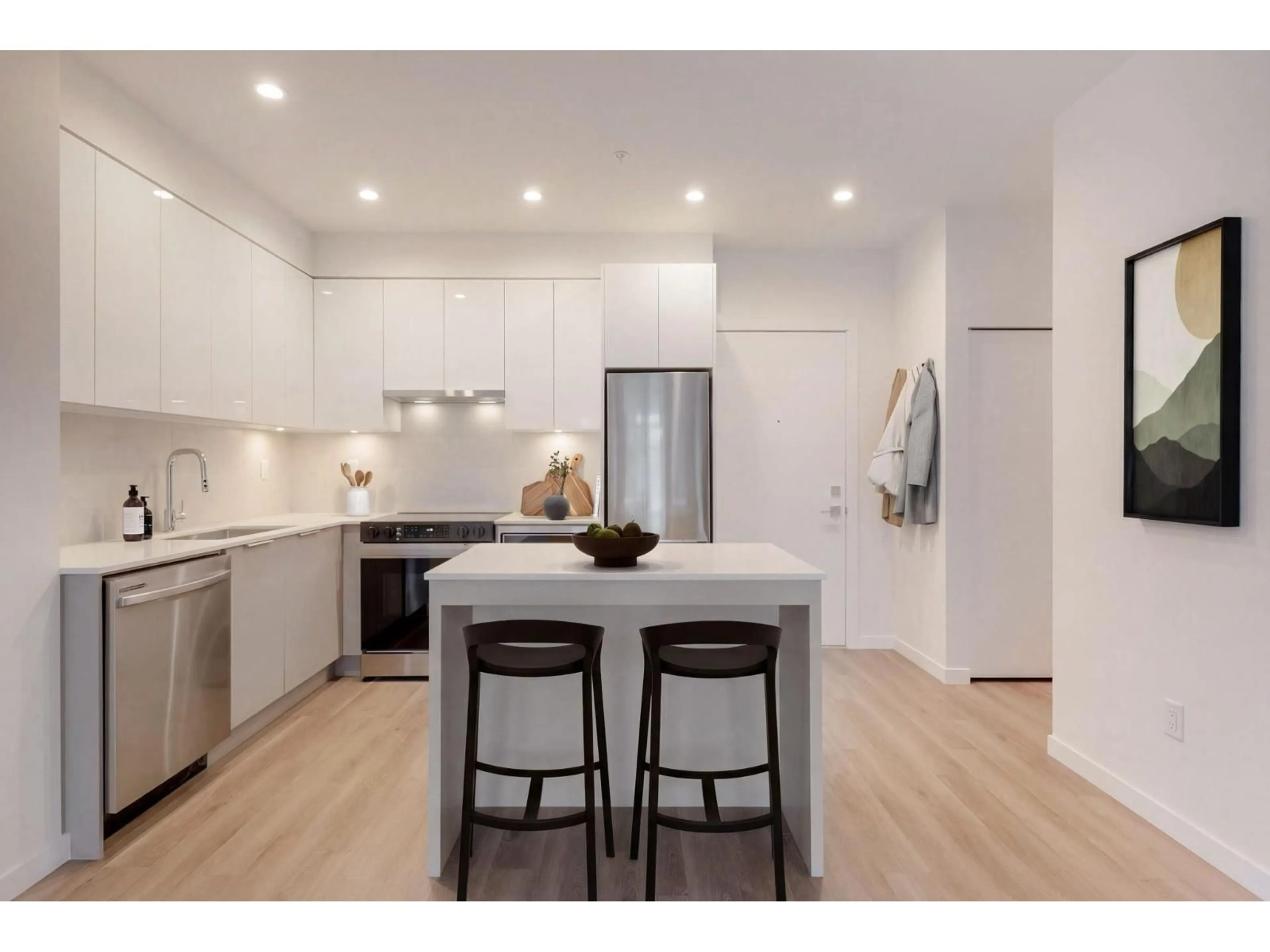 Open concept kitchen, wood/laminate floor for 511 - 14257 103A AVENUE, Surrey British Columbia V3T1T1