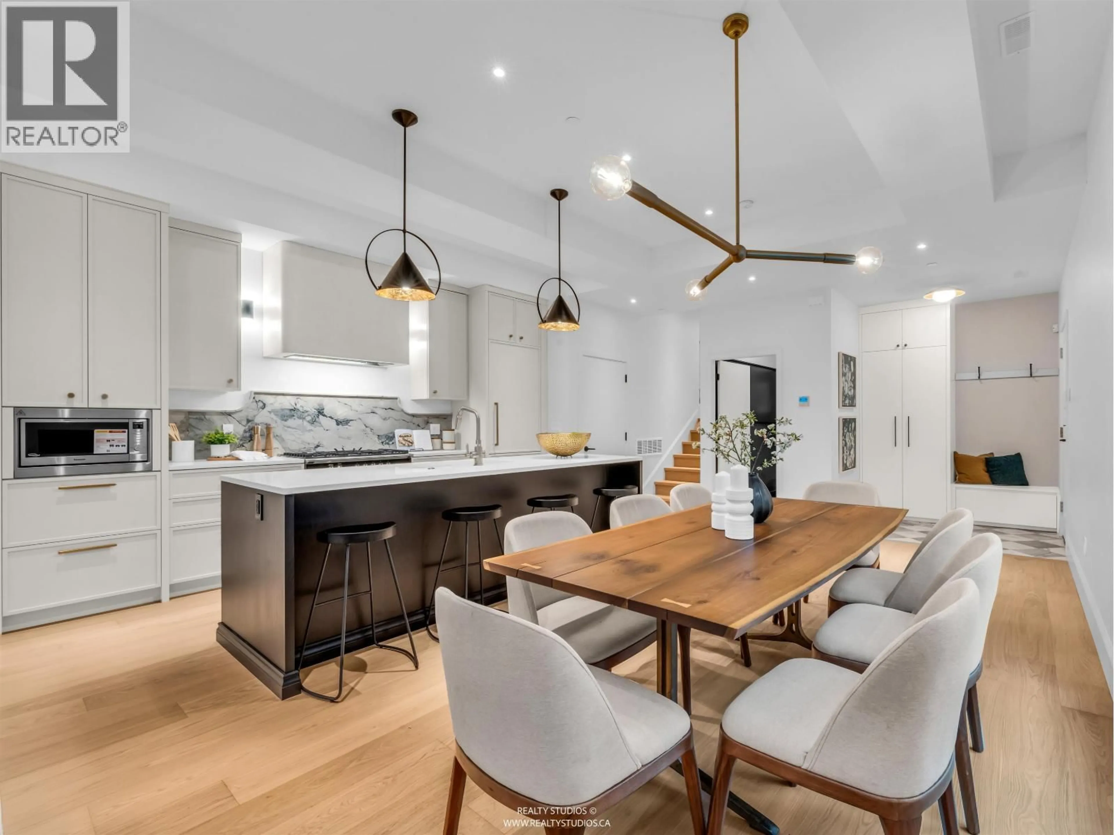 Open concept kitchen, wood/laminate floor for 4090 MAPLE CRESCENT, Vancouver British Columbia V6J4B2