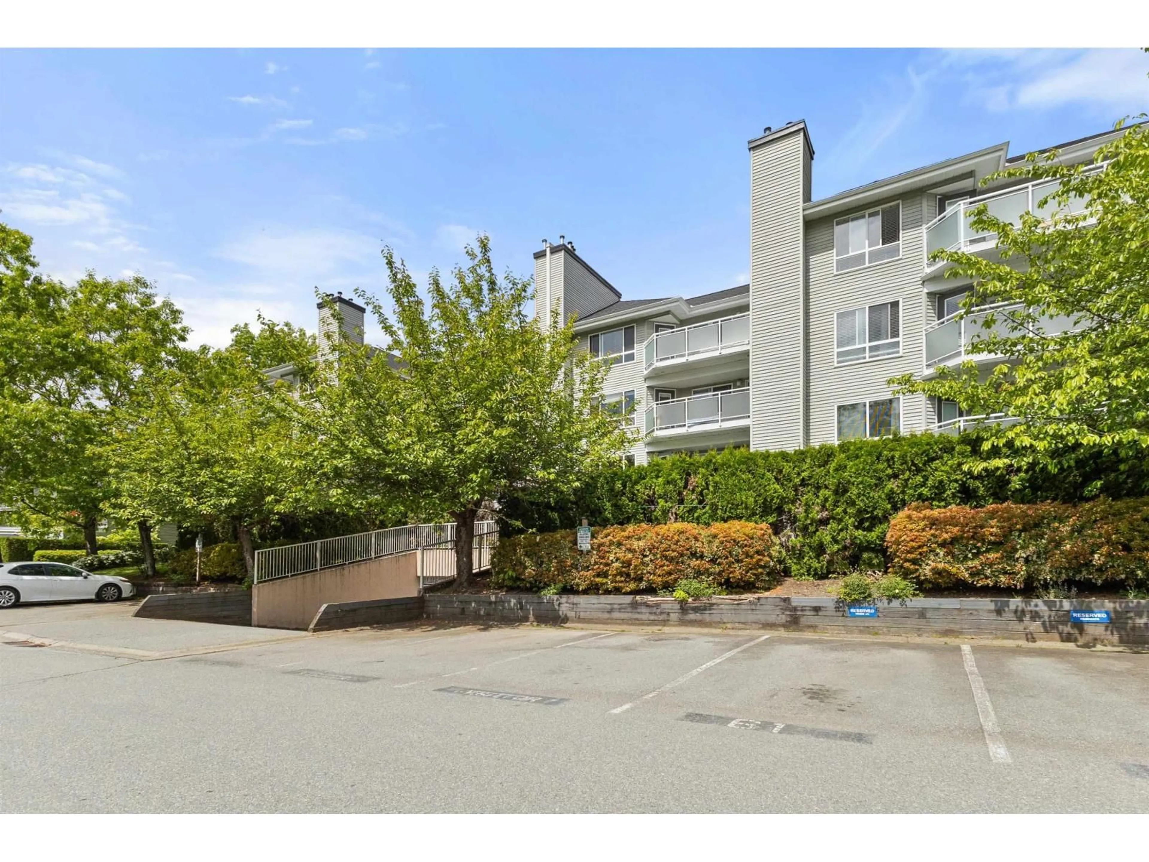 A pic from outside/outdoor area/front of a property/back of a property/a pic from drone, mountain view for 405 - 13680 84 AVENUE, Surrey British Columbia V3W0T6