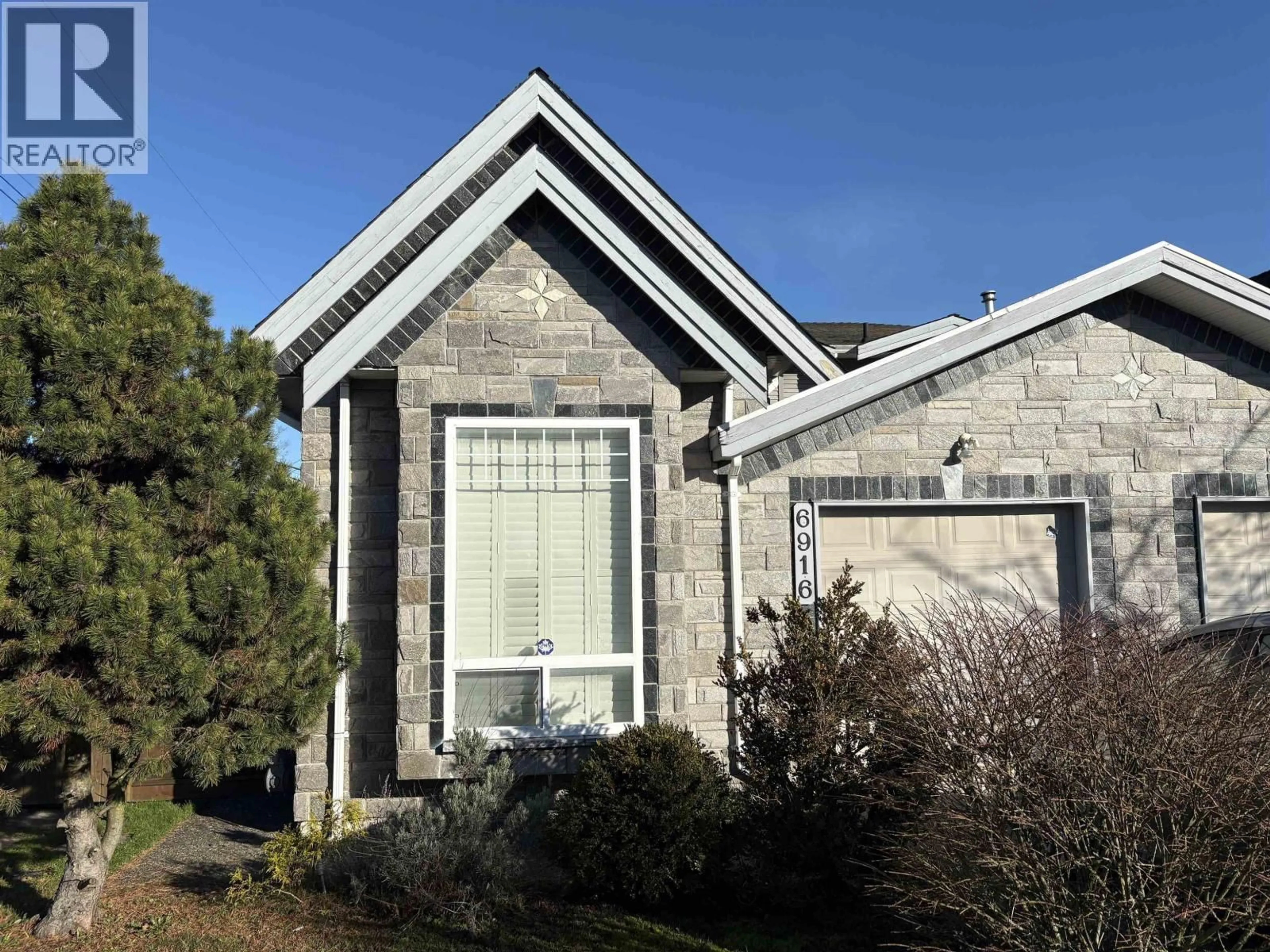 Home with brick exterior material, building for 6916 CUNNINGHAM COURT, Burnaby British Columbia V5E0B1