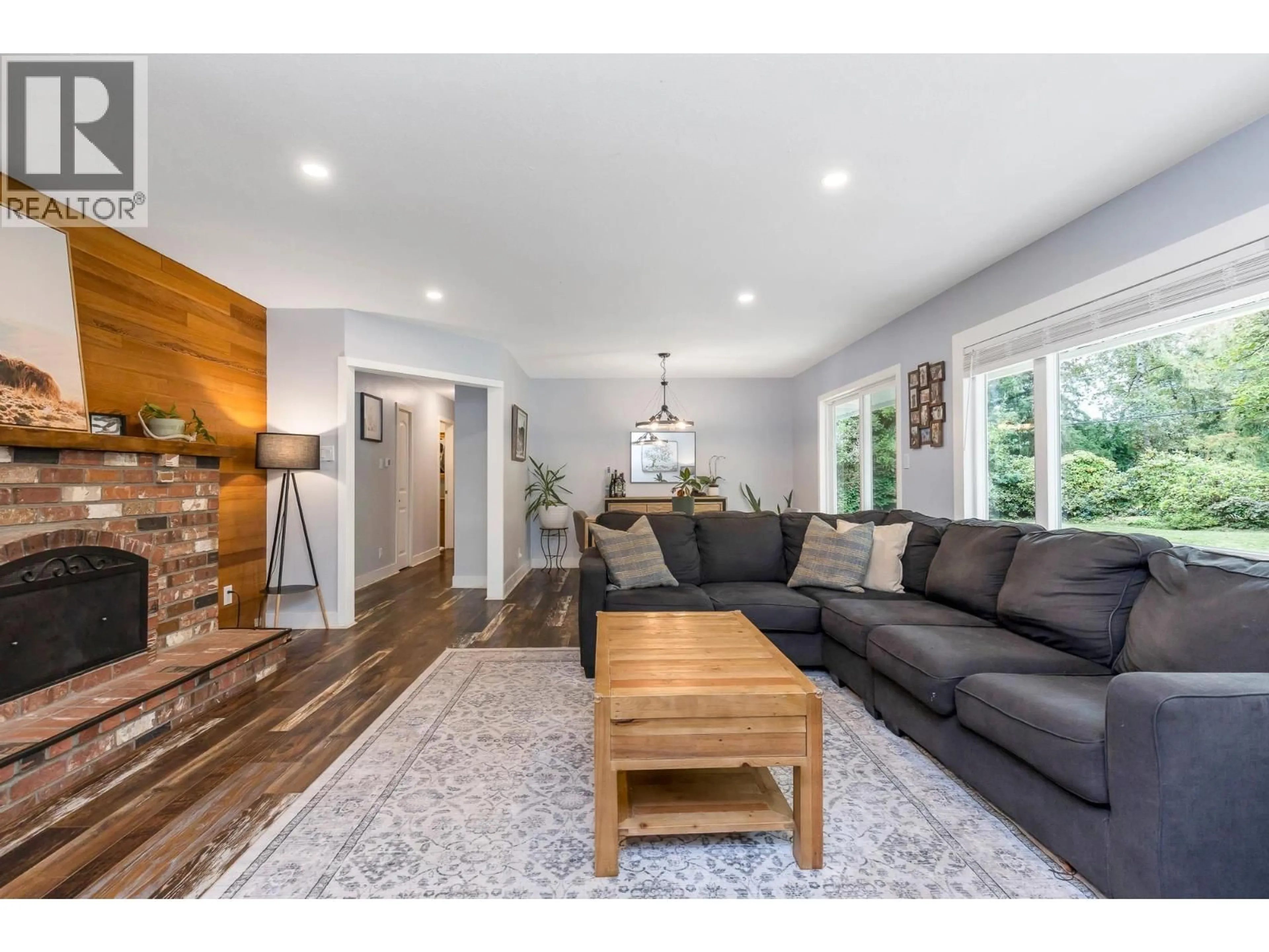 Living room with furniture, wood/laminate floor for 24320 116 AVENUE, Maple Ridge British Columbia V4R1L7