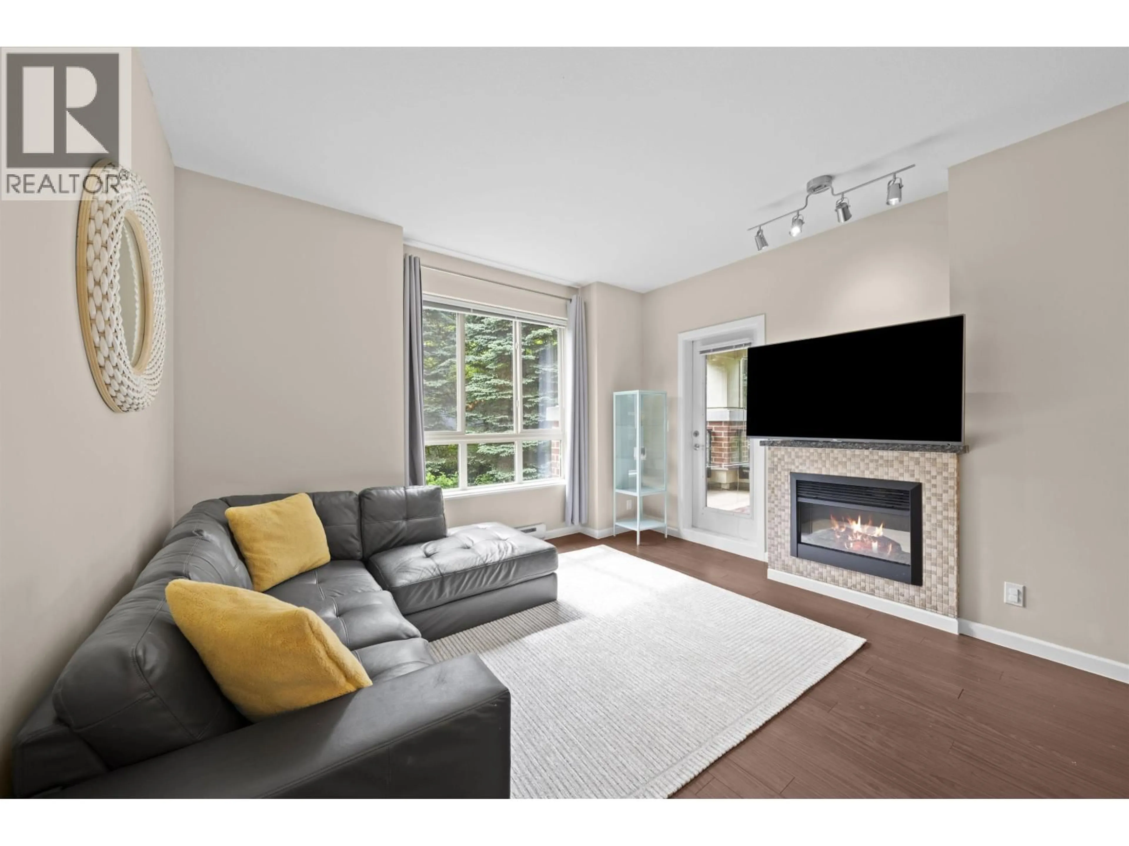 Living room with furniture, unknown for 209 - 270 FRANCIS WAY, New Westminster British Columbia V3L0C3