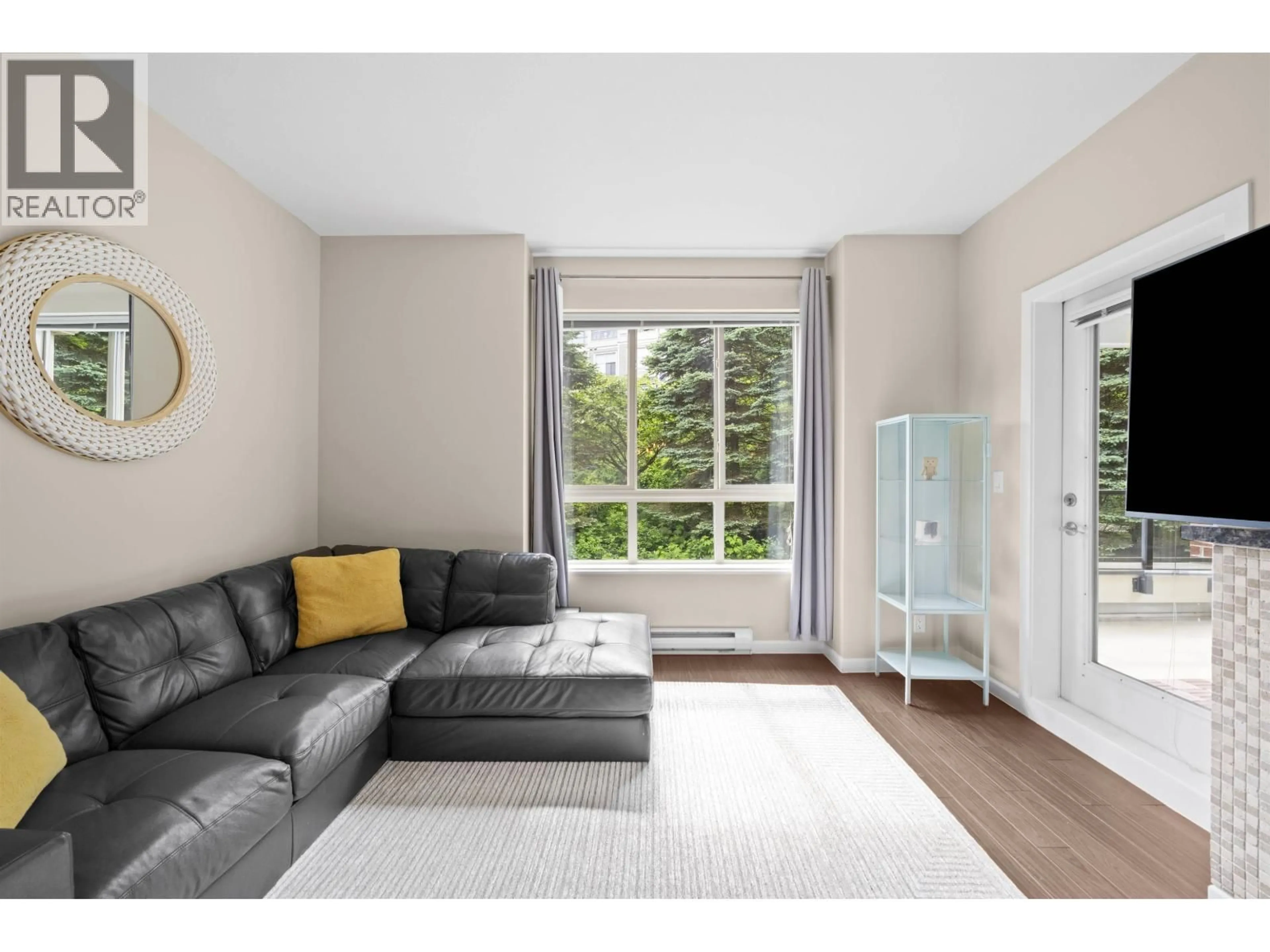 Living room with furniture, unknown for 209 - 270 FRANCIS WAY, New Westminster British Columbia V3L0C3