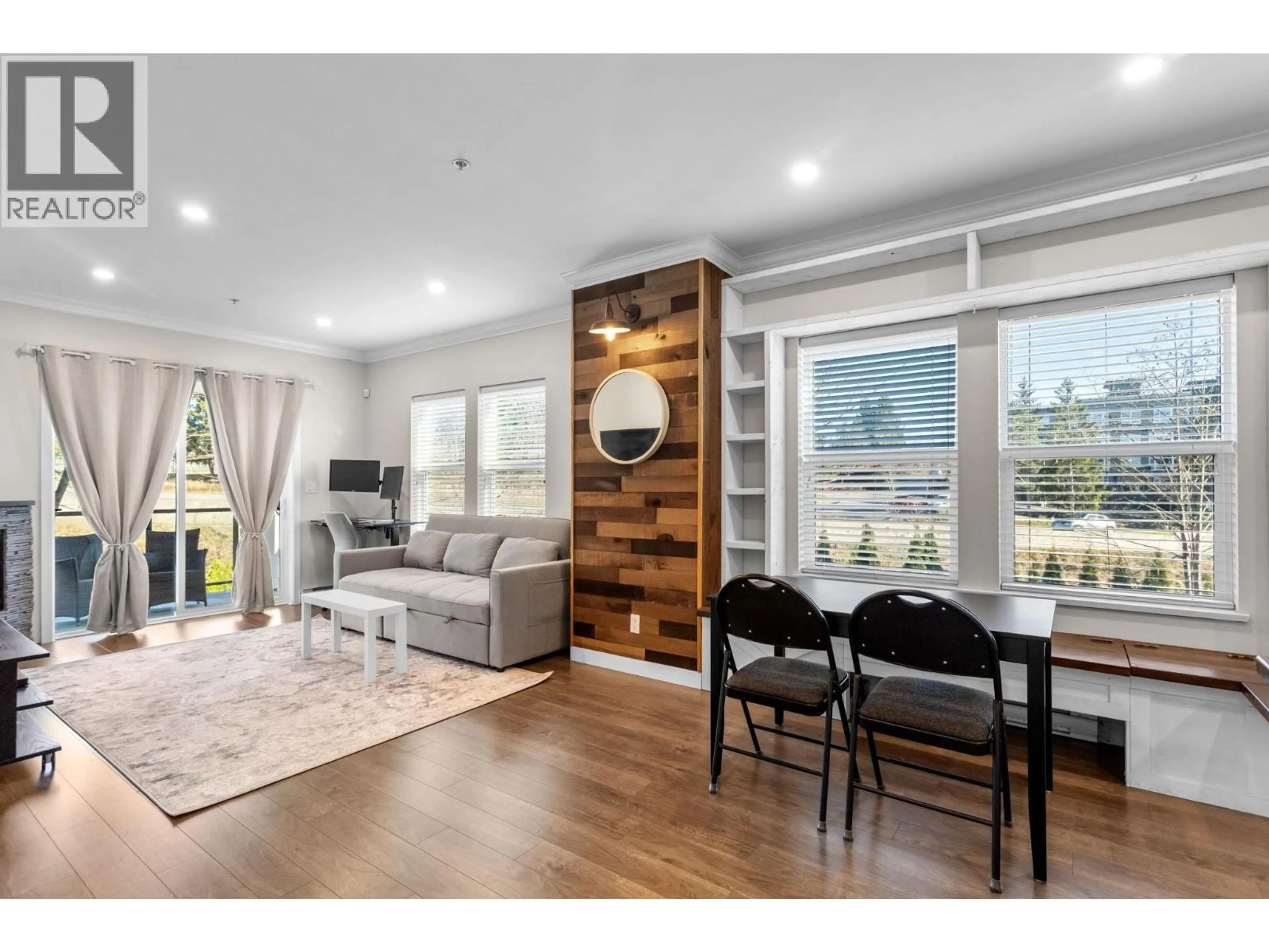 Living room with furniture, wood/laminate floor for 206 - 11580 223 STREET, Maple Ridge British Columbia V2X9H1