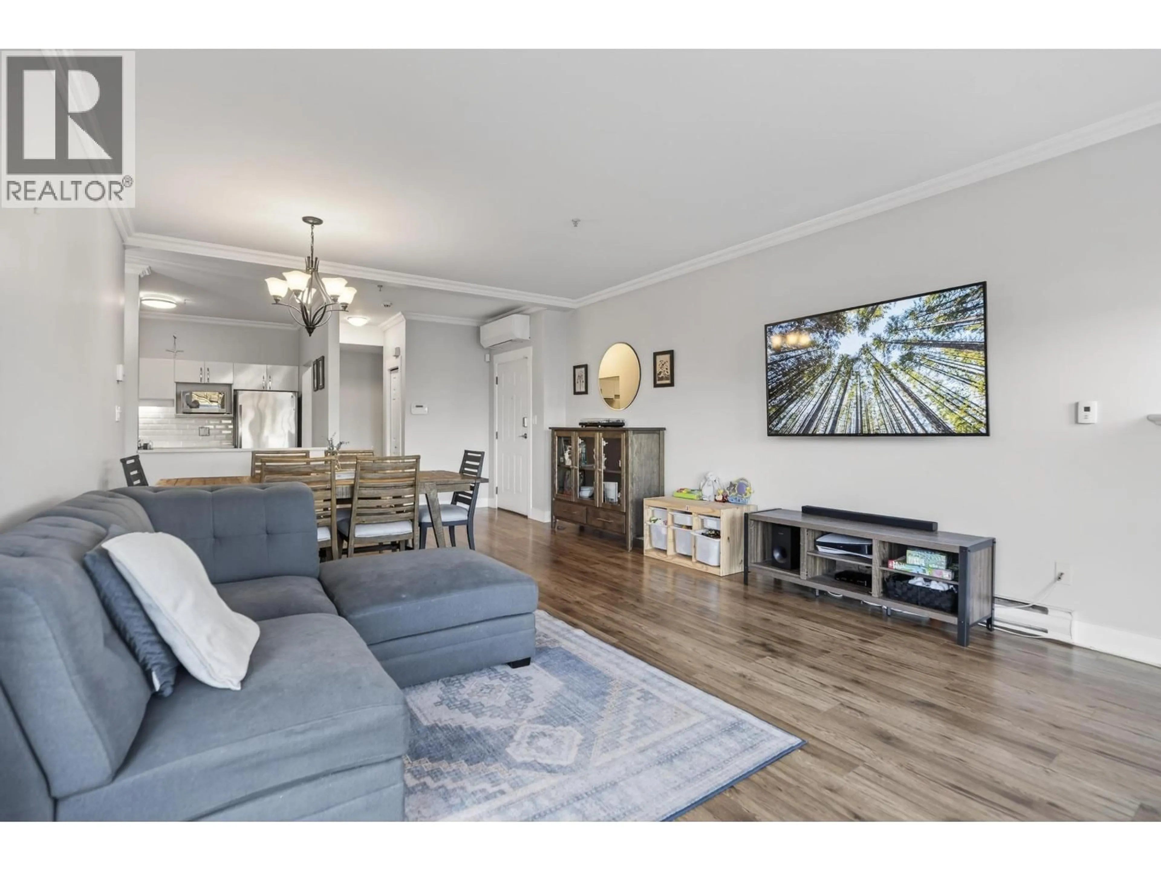 Living room with furniture, wood/laminate floor for 1126 O'FLAHERTY GATE, Port Coquitlam British Columbia V3C6H2