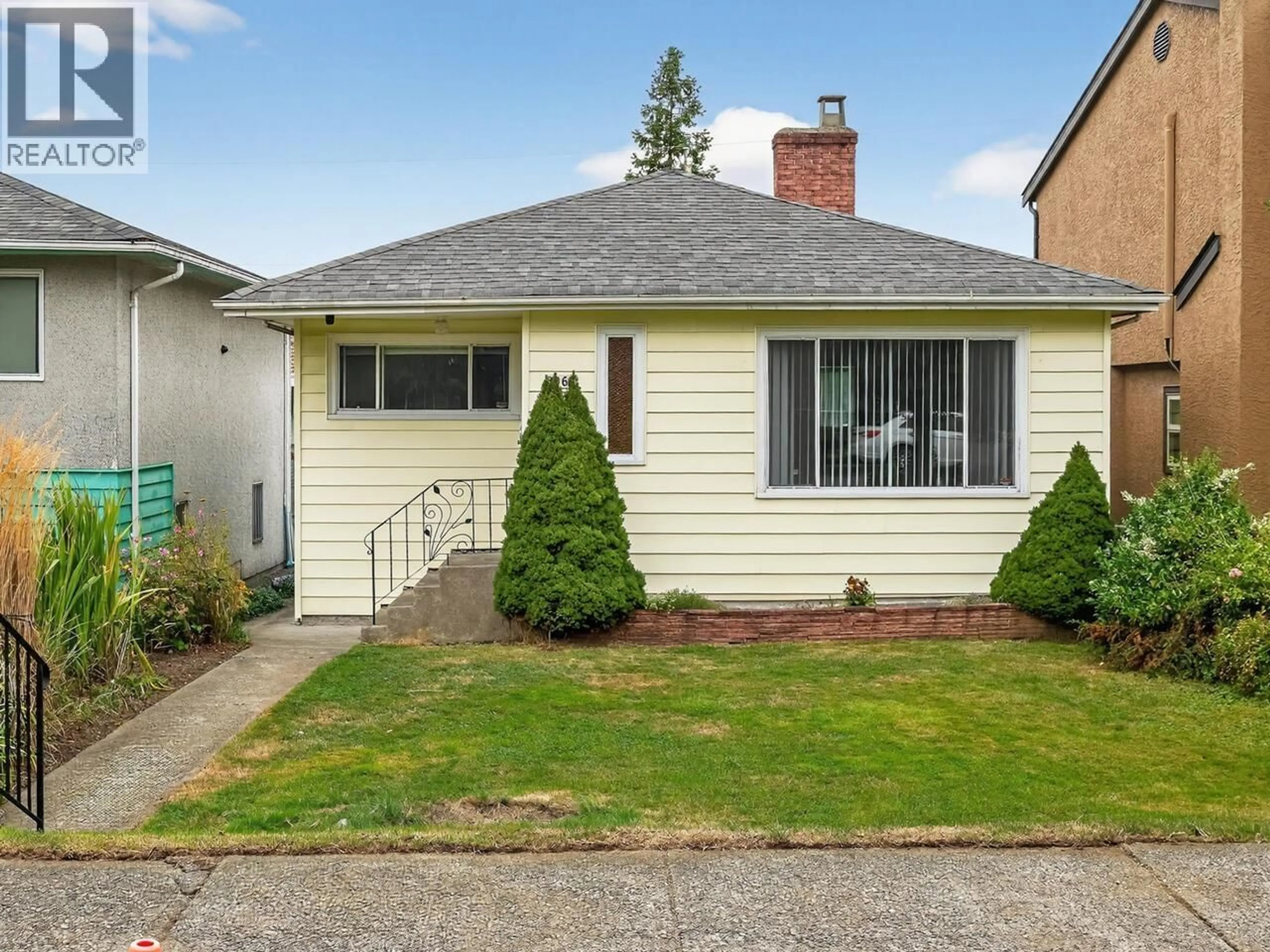 Home with vinyl exterior material, street for 3069 18TH AVENUE, Vancouver British Columbia V5M2R4