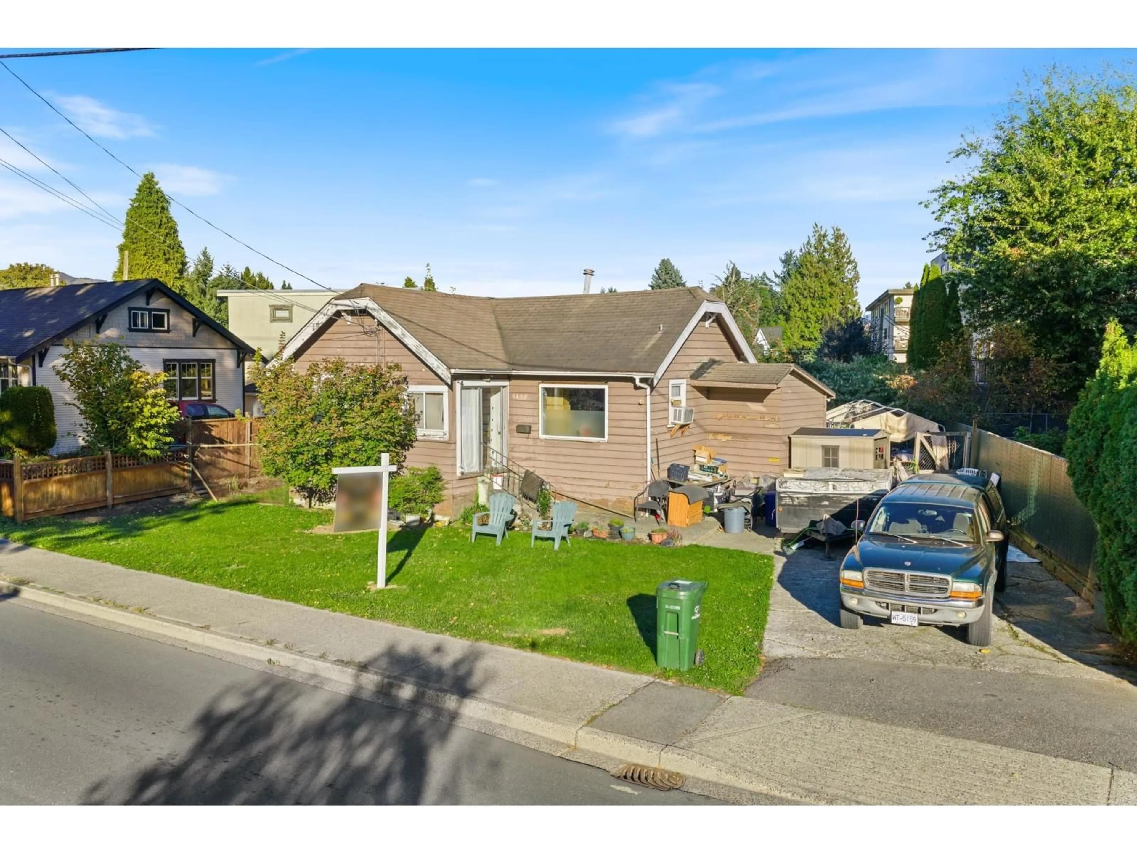 A pic from outside/outdoor area/front of a property/back of a property/a pic from drone, street for 9430 YOUNG ROAD, Chilliwack British Columbia V2P4S5