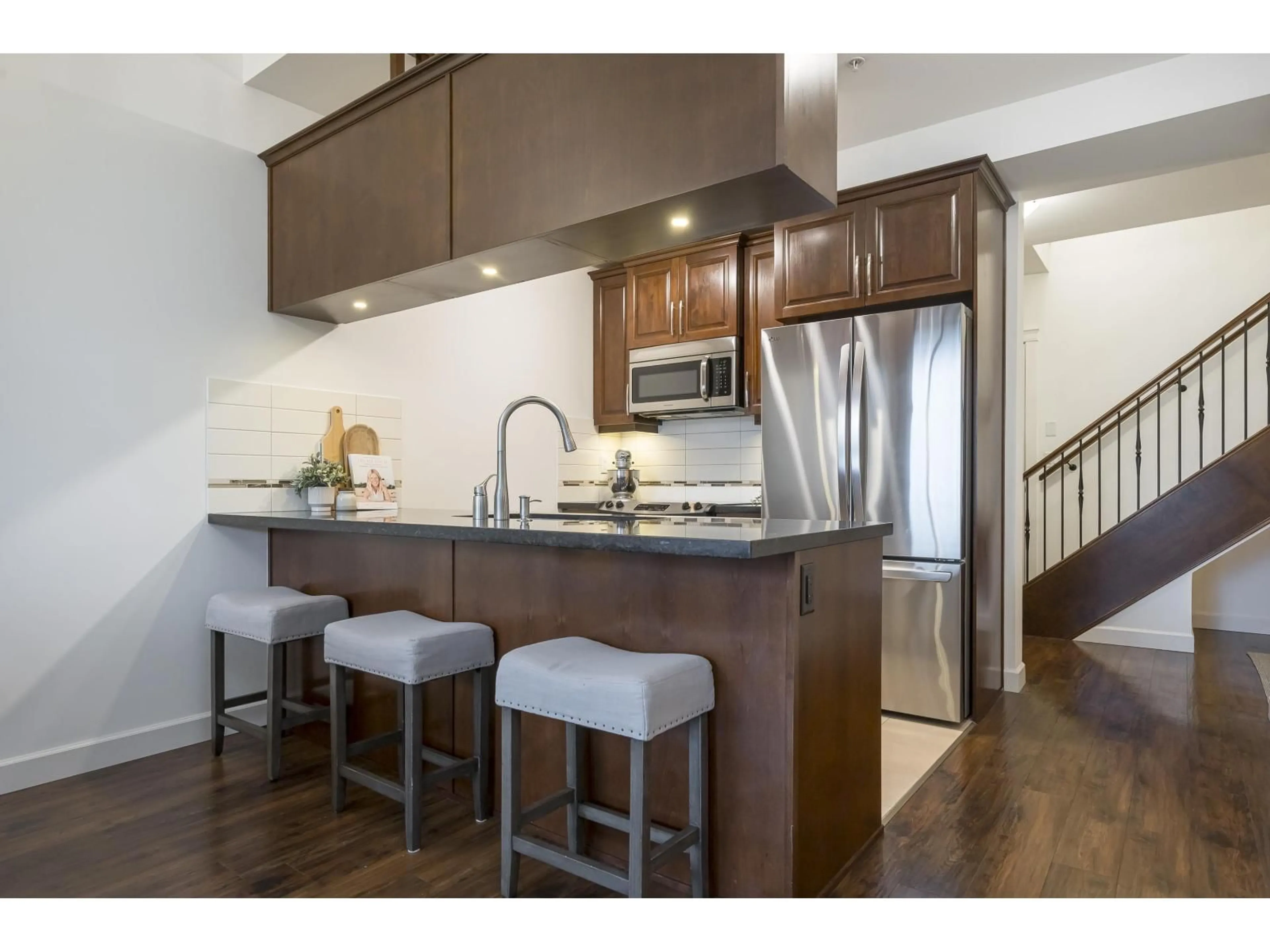 Open concept kitchen, wood/laminate floor for 592 - 8288 207A STREET, Langley British Columbia V2Y0L2