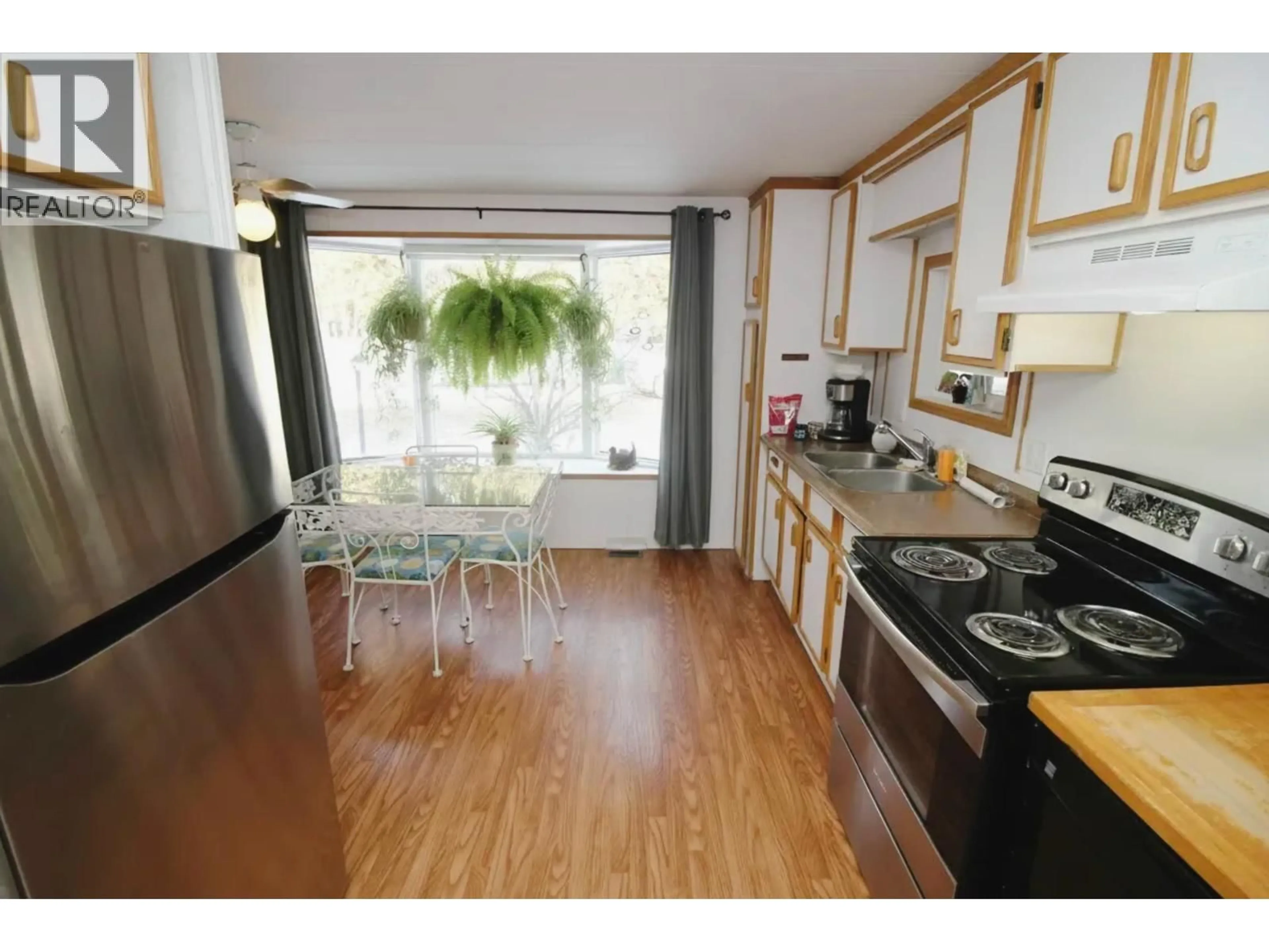 Standard kitchen, wood/laminate floor for 7 - 3960 DRIVE-IN ROAD, Houston British Columbia V0J1Z2