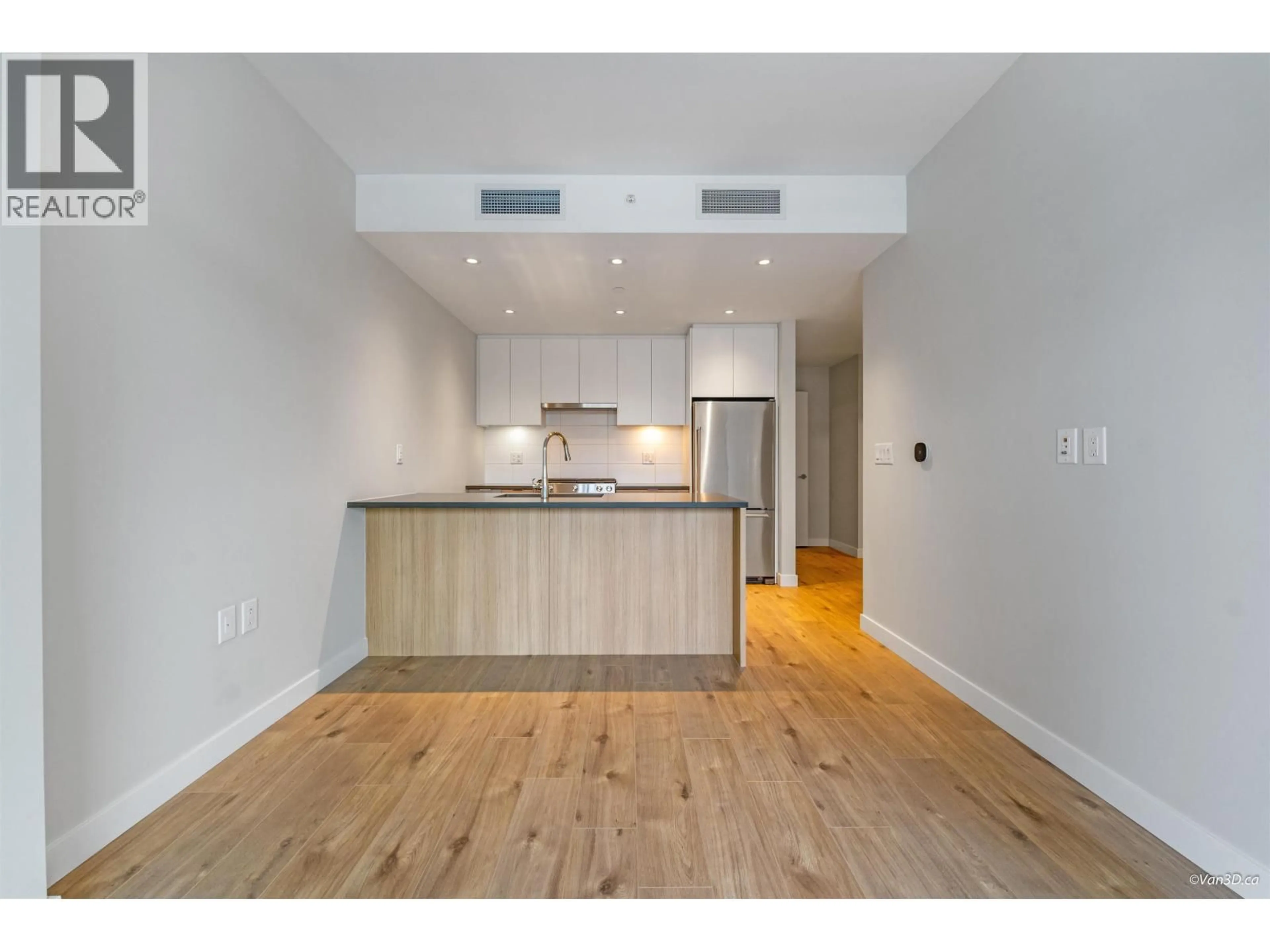 Open concept kitchen, wood/laminate floor for 1205 - 3430 KENT AVENUE SOUTH, Vancouver British Columbia V5S0G7