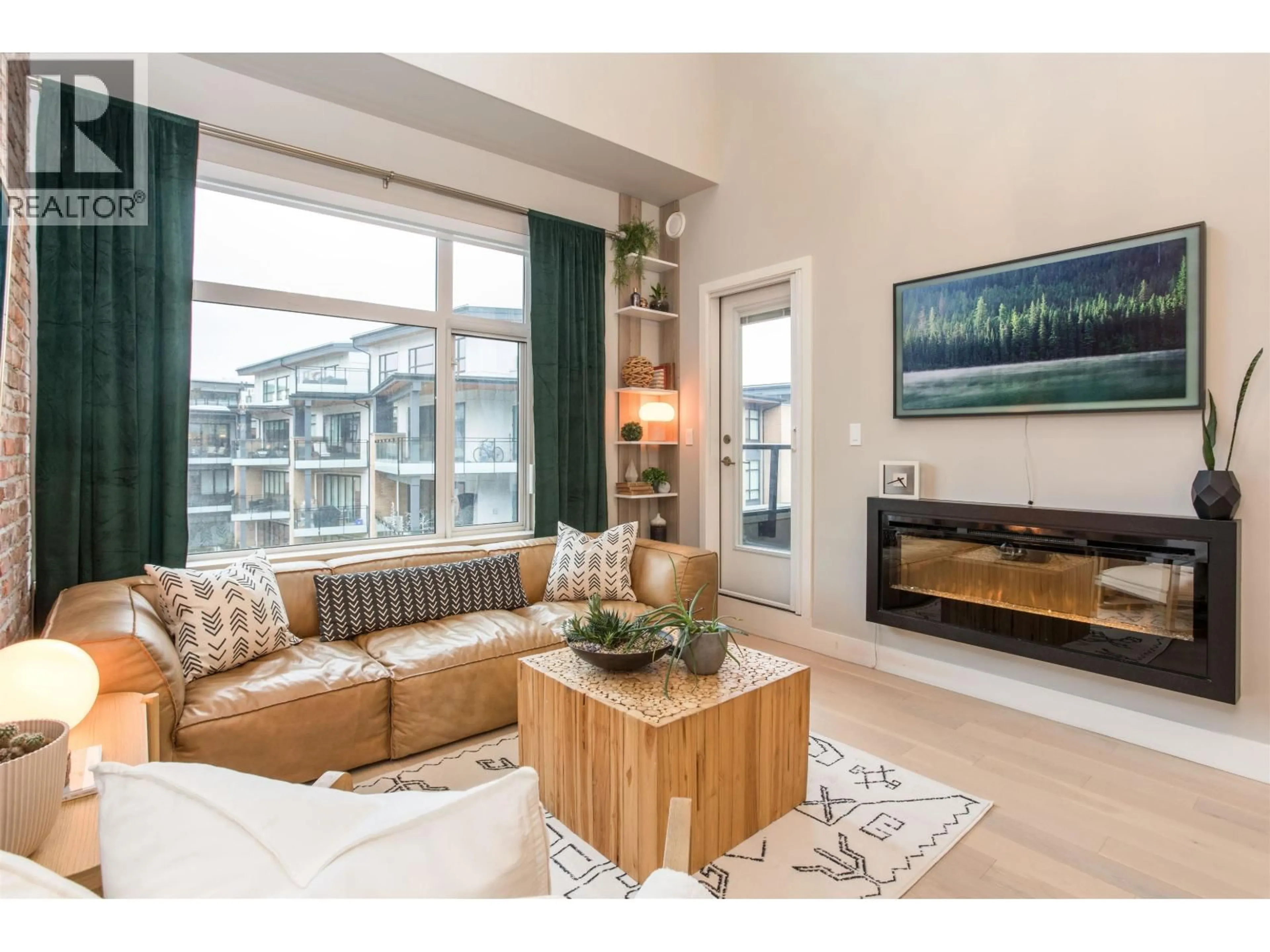 Living room with furniture, wood/laminate floor for 414 - 262 SALTER STREET, New Westminster British Columbia V3M0J6