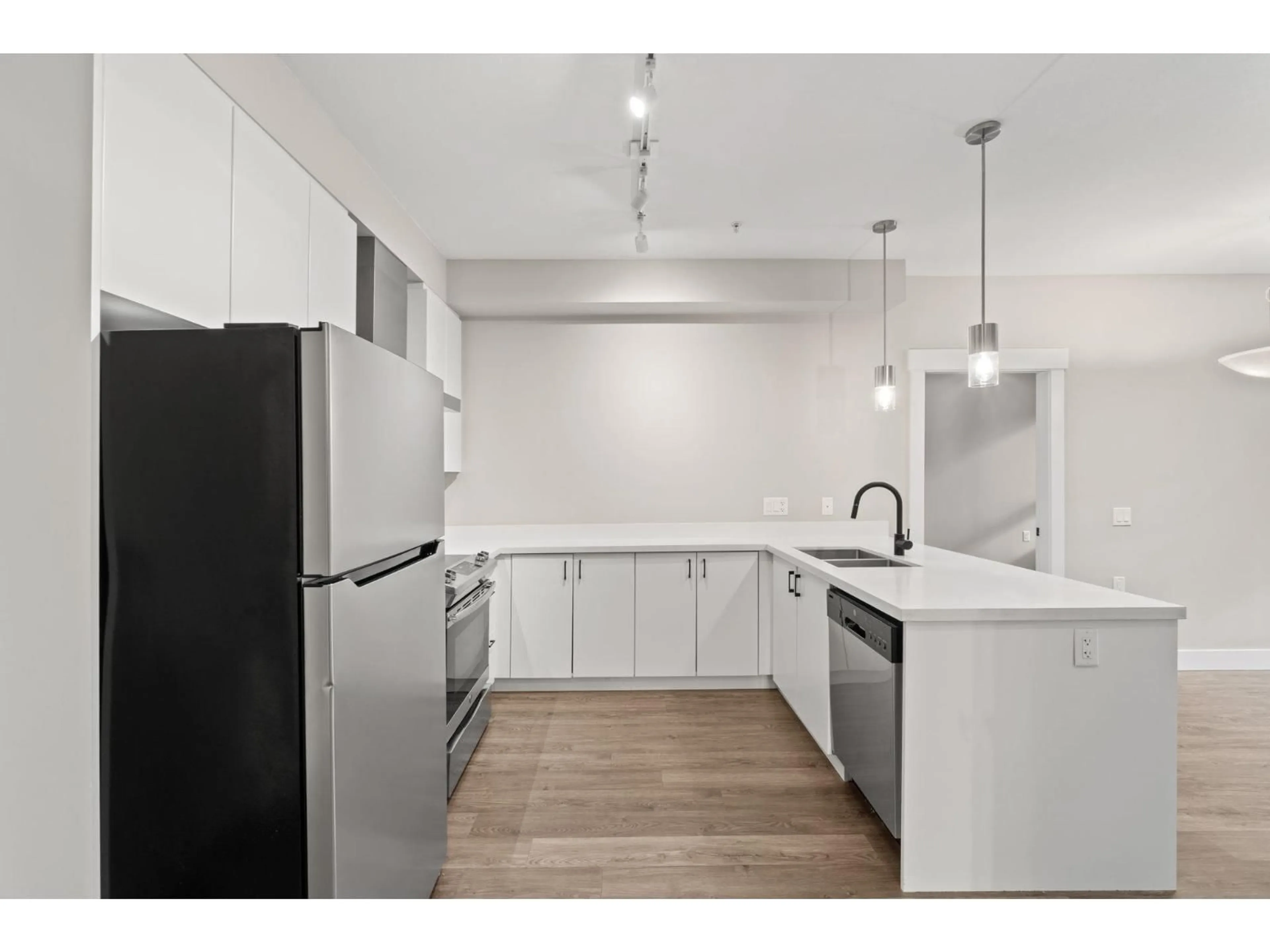 Standard kitchen, wood/laminate floor for A101 - 20838 78B AVENUE, Langley British Columbia V2Y3M1