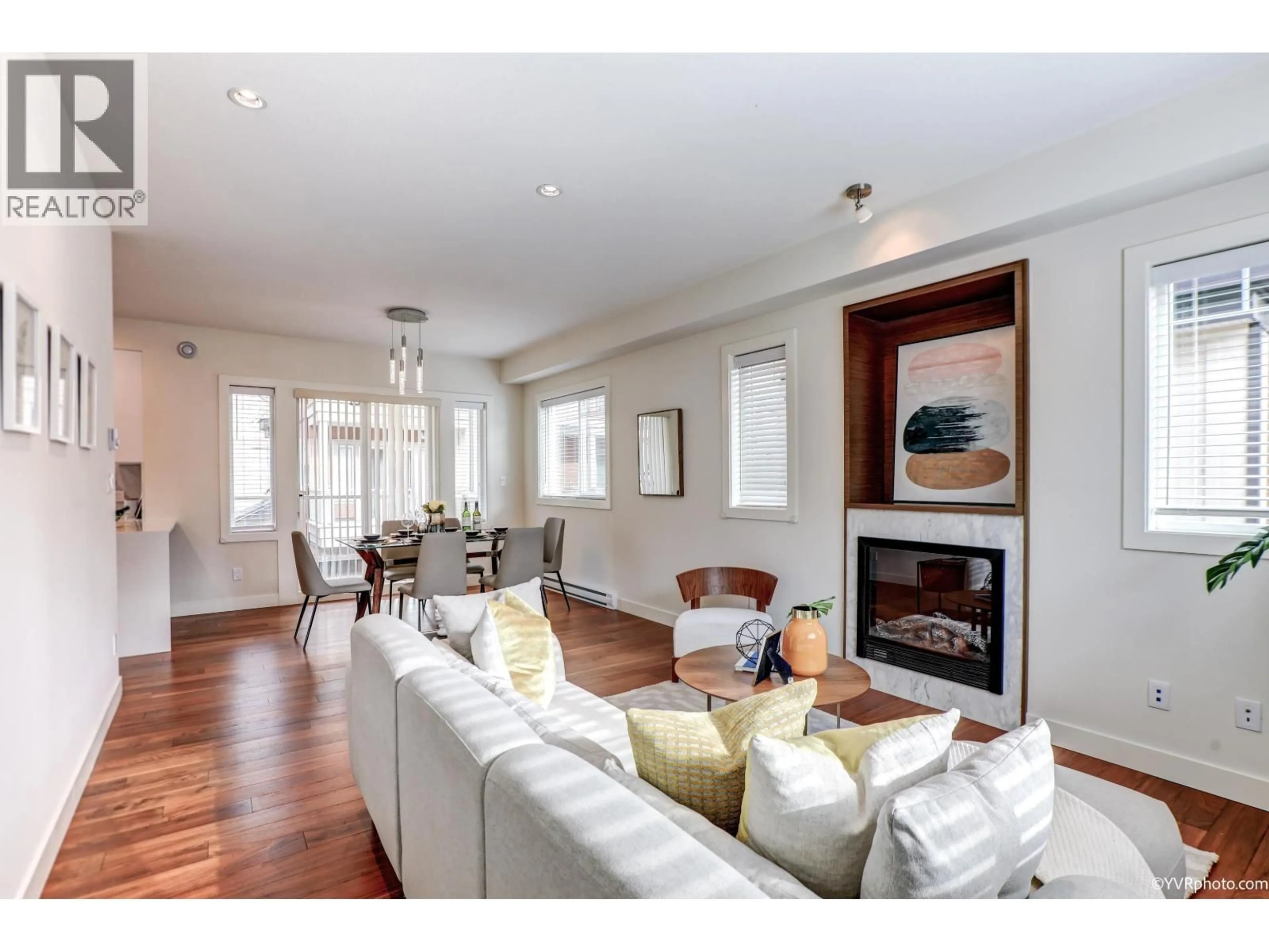 Living room with furniture, wood/laminate floor for 8 - 7199 MOFFATT ROAD, Richmond British Columbia V6Y1X9