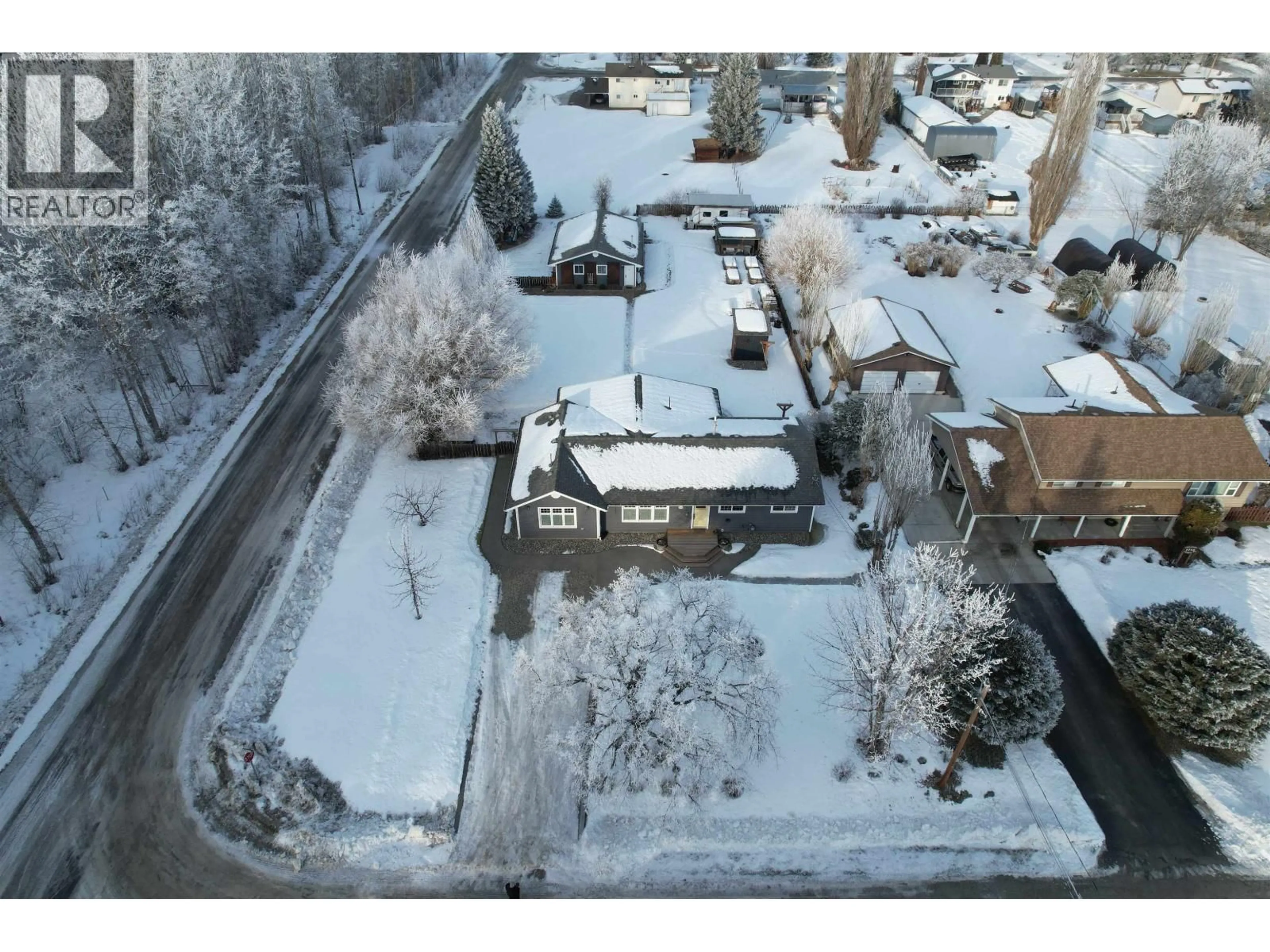 A pic from outside/outdoor area/front of a property/back of a property/a pic from drone, street for 1702 CYPRESS ROAD, Quesnel British Columbia V2J4B2