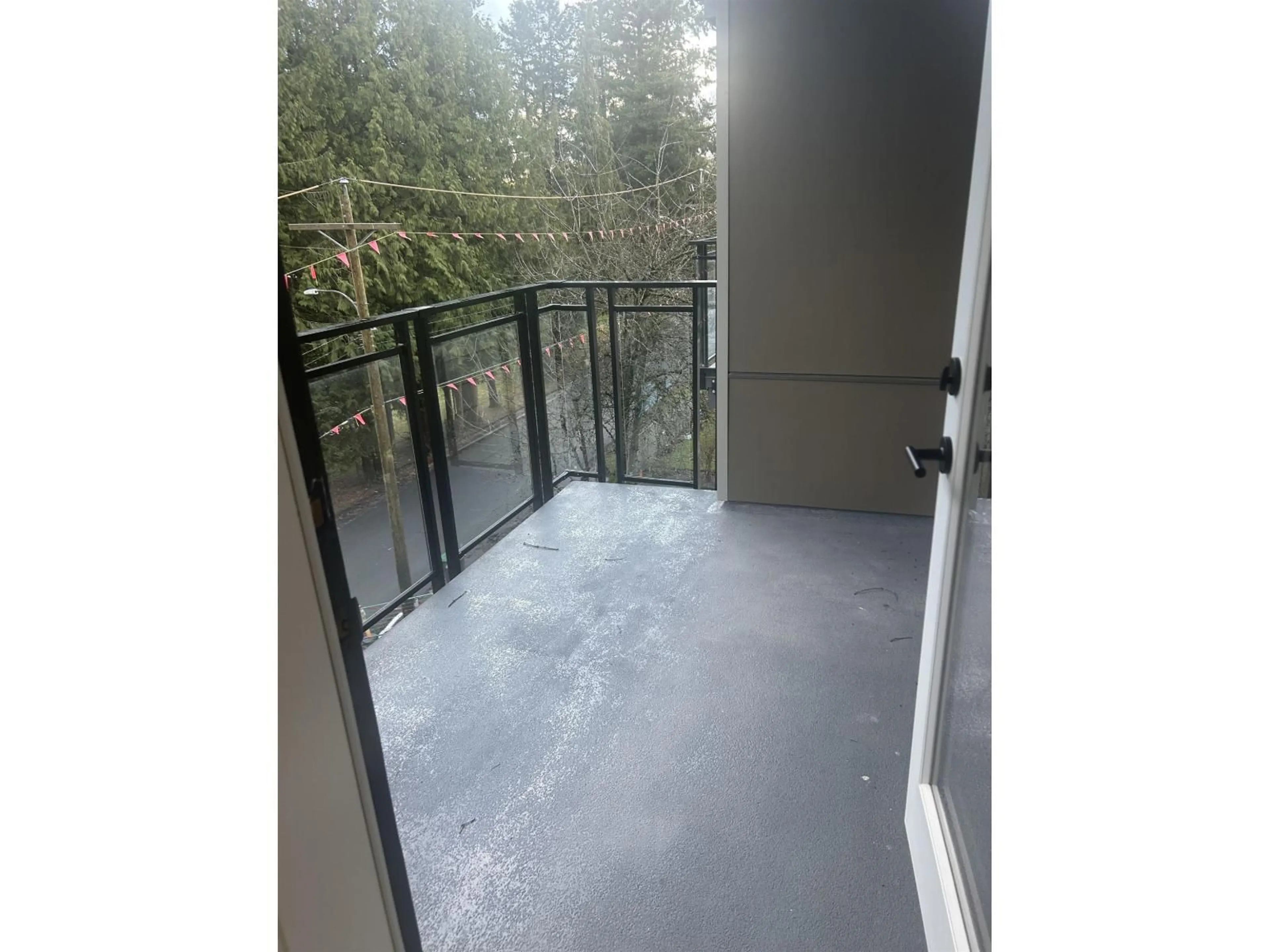 Balcony in the apartment, forest/trees view for 402 - 13439 94A AVENUE, Surrey British Columbia V3V0G9