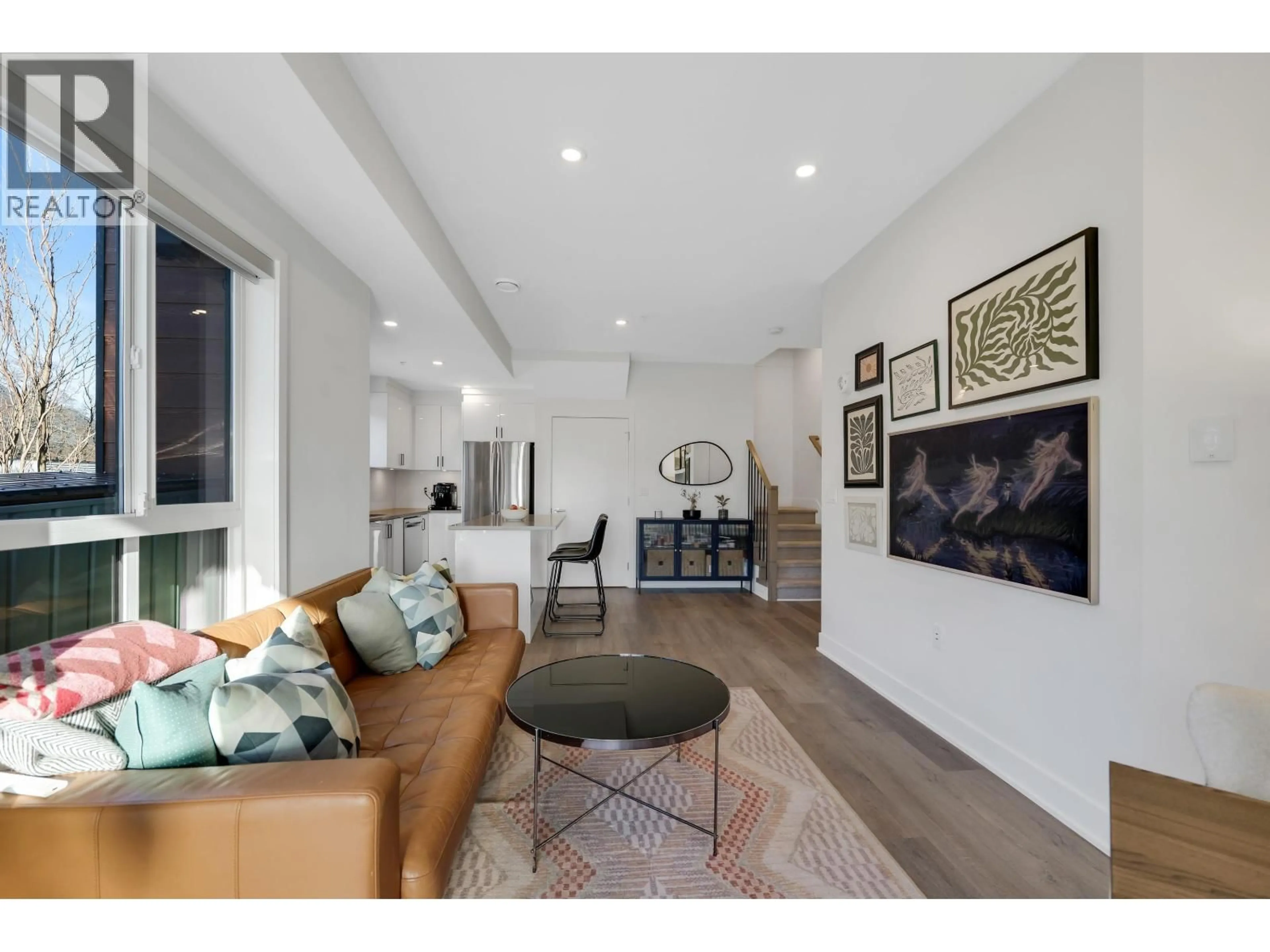 Living room with furniture, unknown for 207 - 37808 THIRD AVENUE, Squamish British Columbia V8B1B9