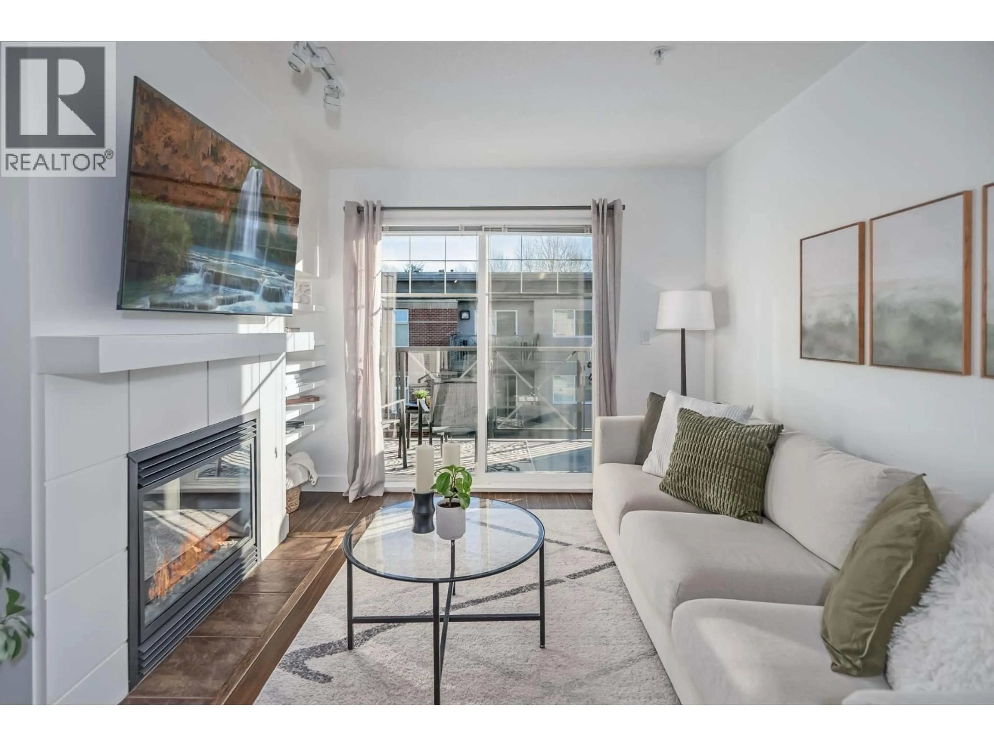 Living room with furniture, wood/laminate floor for 407 - 3240 ST JOHNS STREET, Port Moody British Columbia V3H0C1