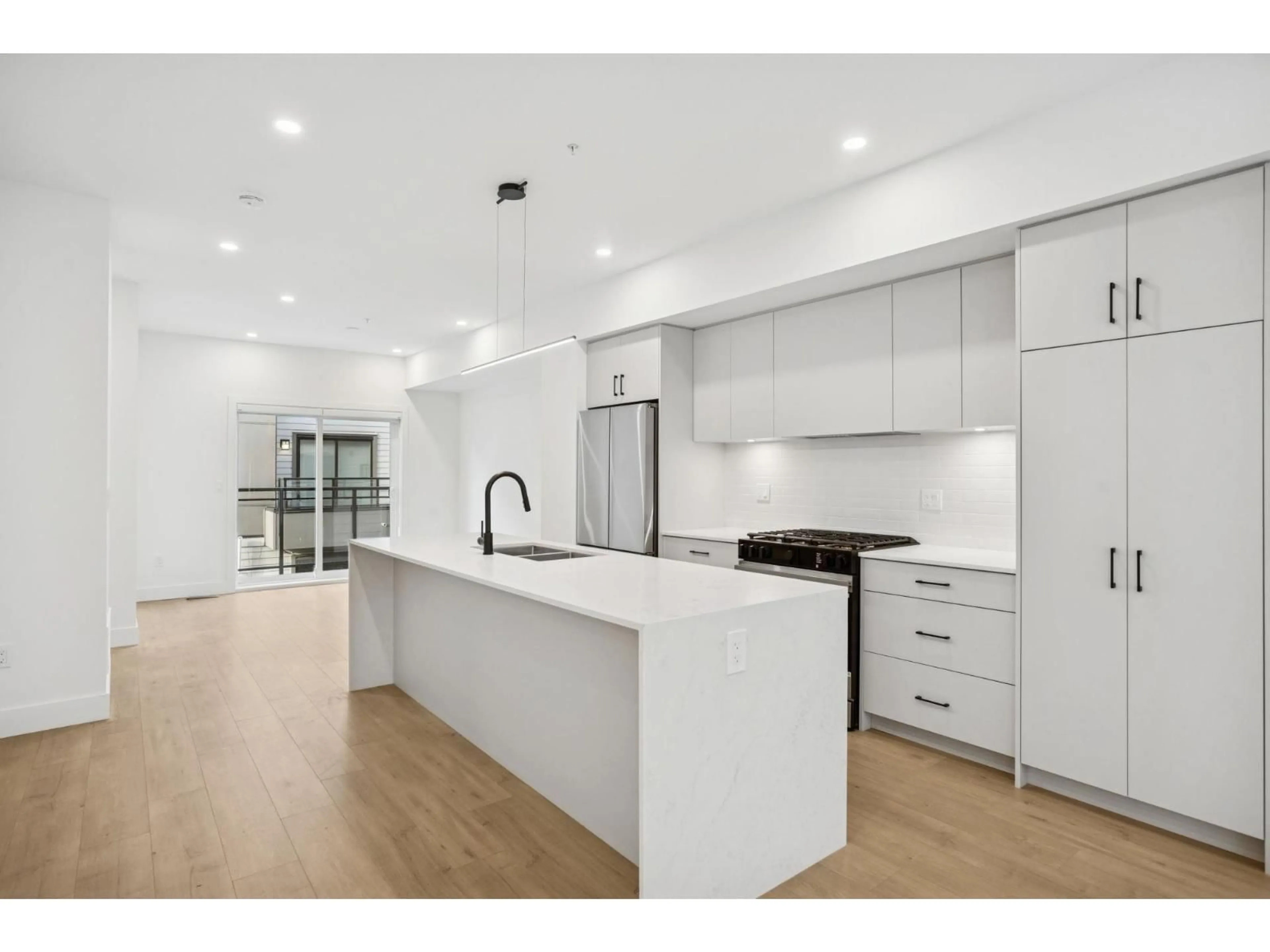 Open concept kitchen, unknown for 1 - 19667 55A AVENUE, Langley British Columbia V3A3X1