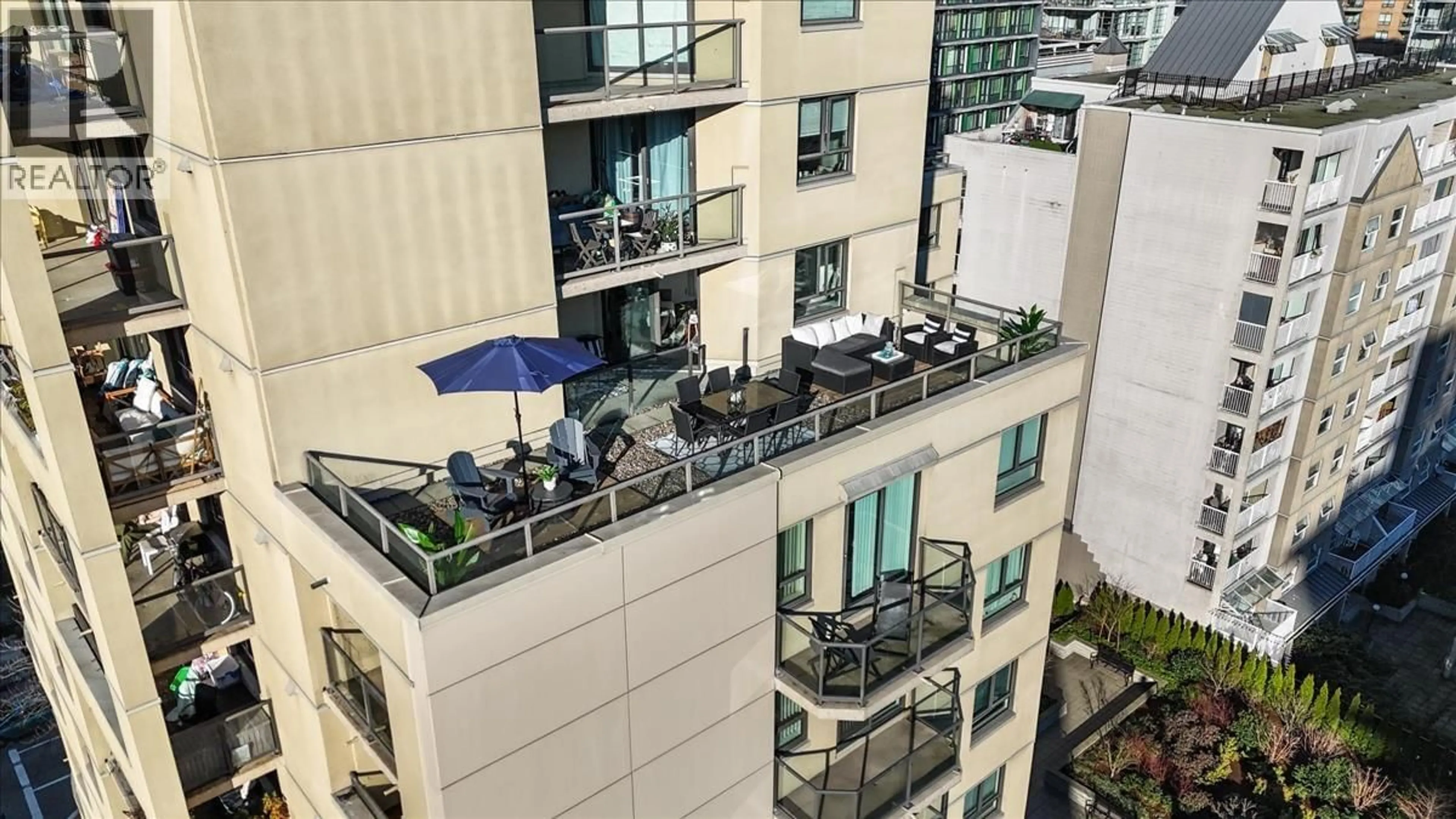 Patio, city buildings view from balcony for 1006 - 789 DRAKE STREET, Vancouver British Columbia V6Z2N7