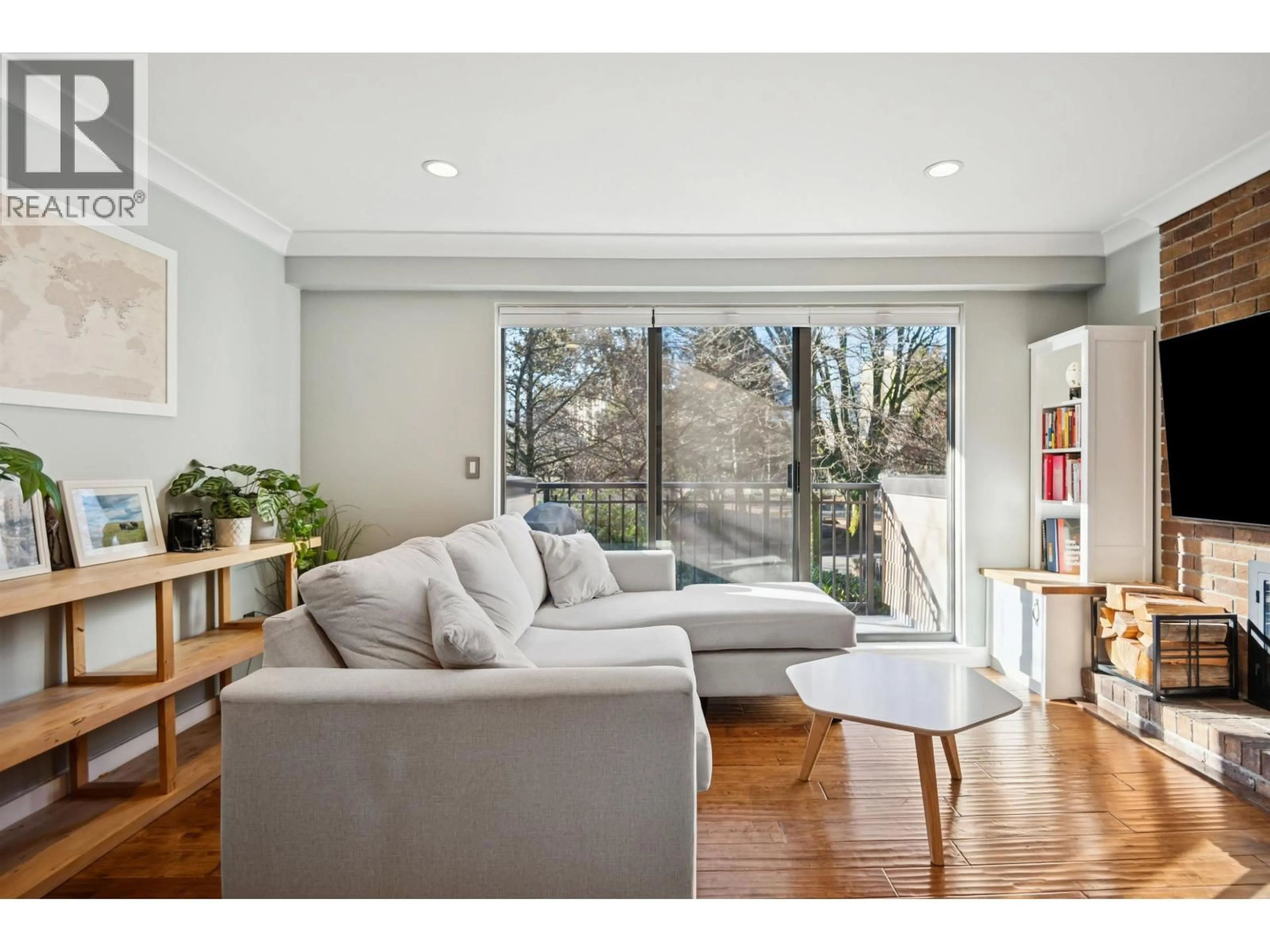 Living room with furniture, wood/laminate floor for 202 - 1157 NELSON STREET, Vancouver British Columbia V6E1J3