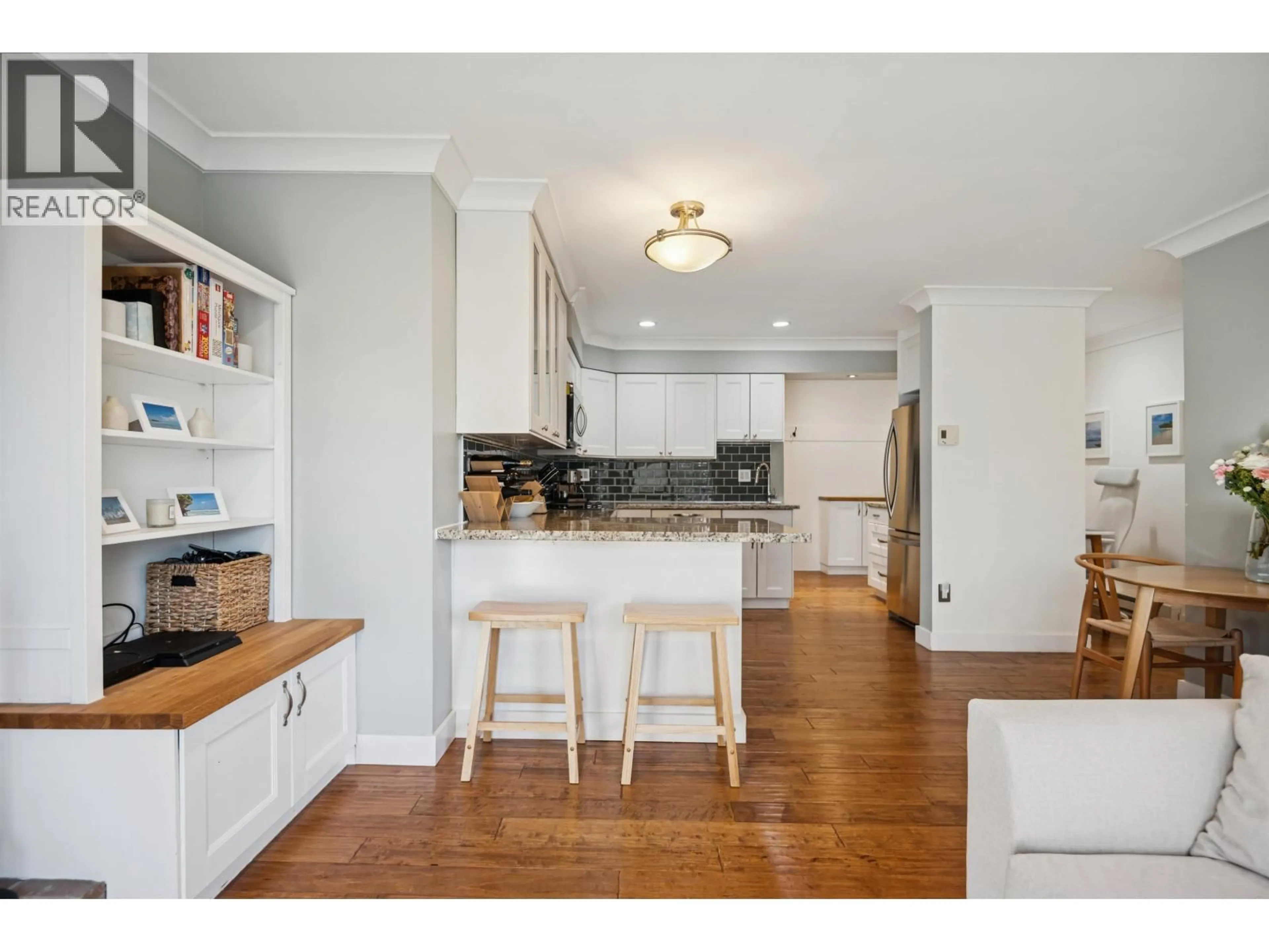 Open concept kitchen, wood/laminate floor for 202 - 1157 NELSON STREET, Vancouver British Columbia V6E1J3