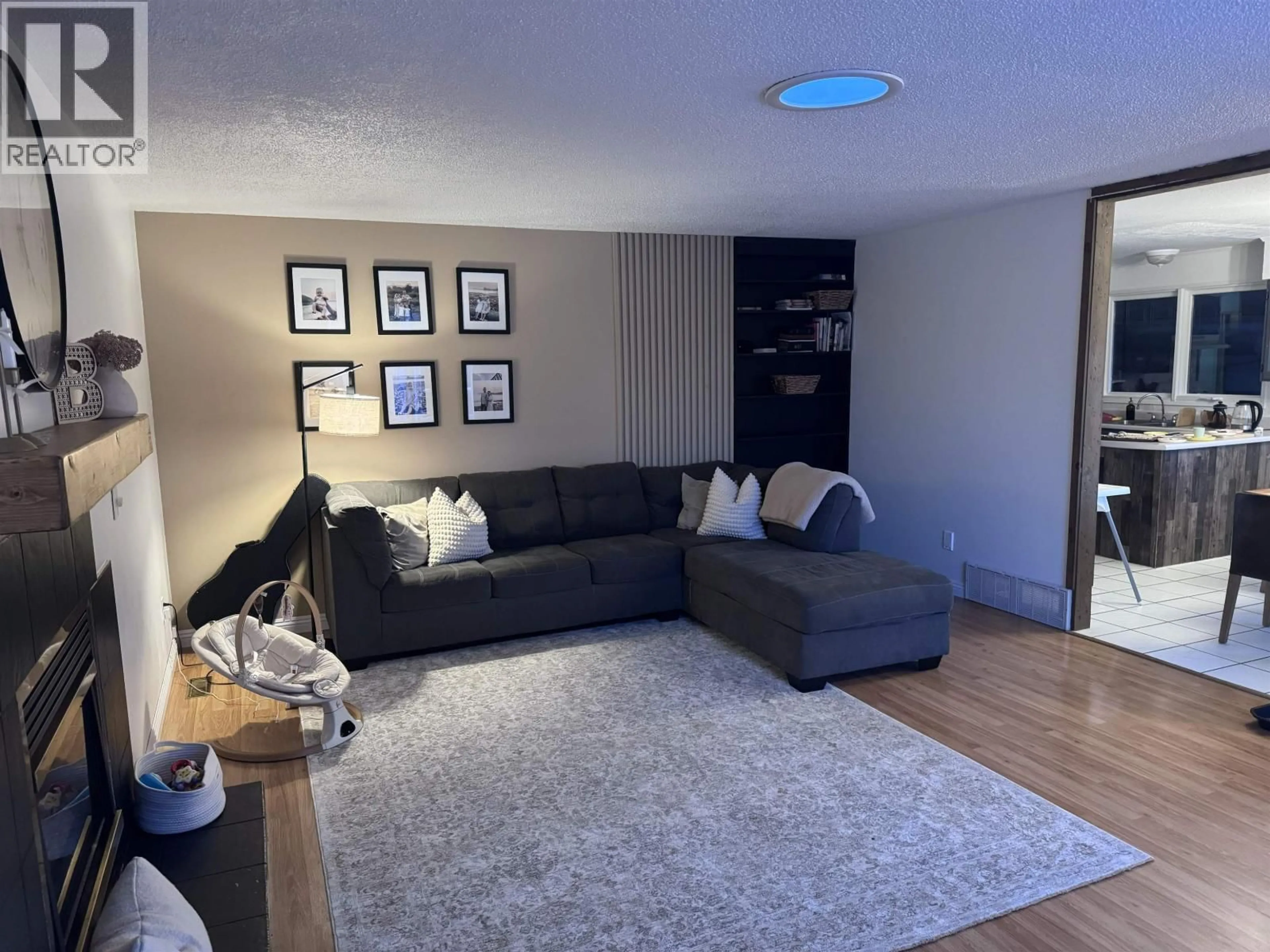 Living room with furniture, unknown for 9219 103 AVENUE, Fort St. John British Columbia V1J2G6