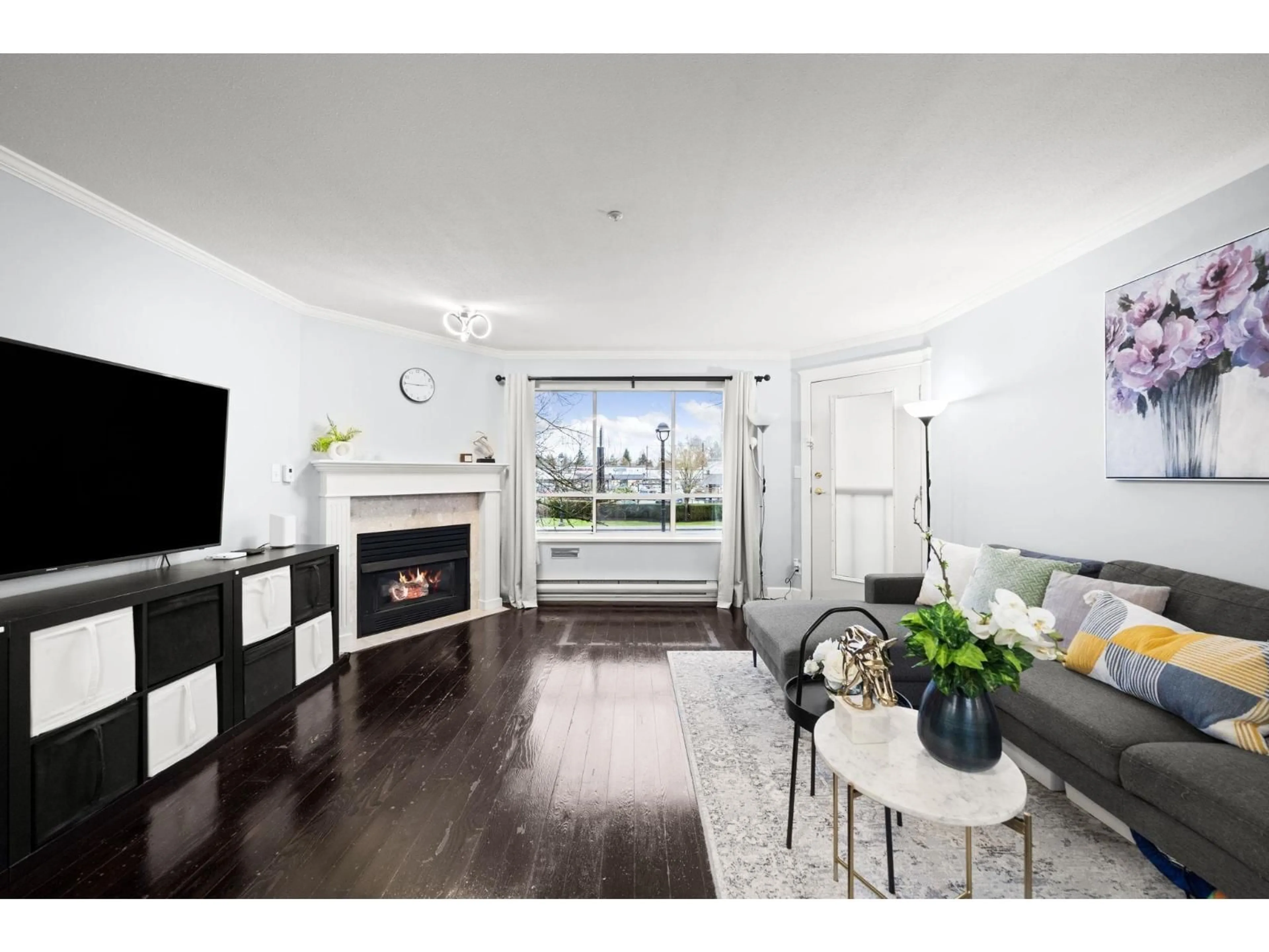 Living room with furniture, wood/laminate floor for 105 - 5450 208 STREET, Langley British Columbia V3A2J9