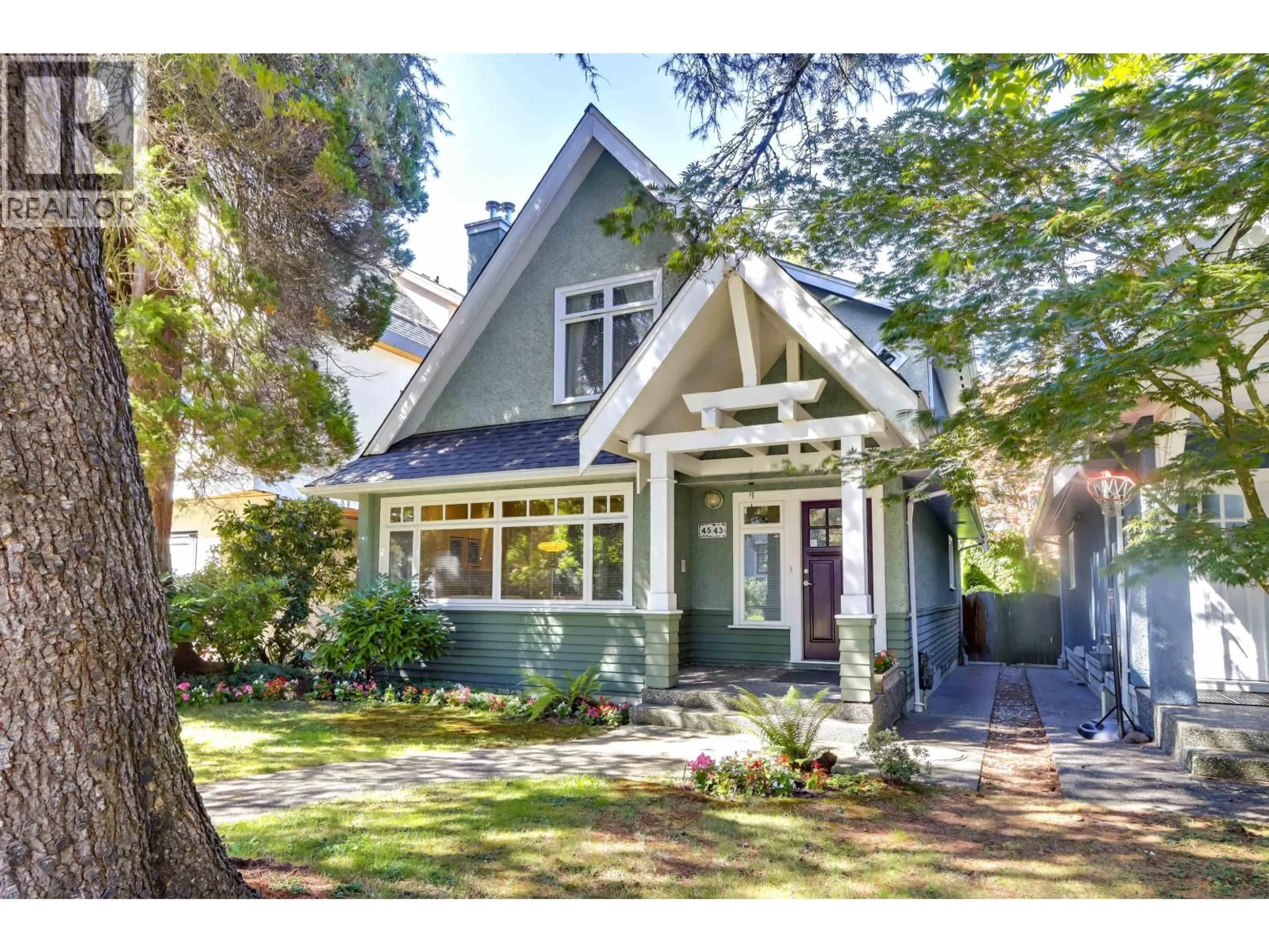 Home with vinyl exterior material, street for 4543 11TH AVENUE, Vancouver British Columbia V6R2M5