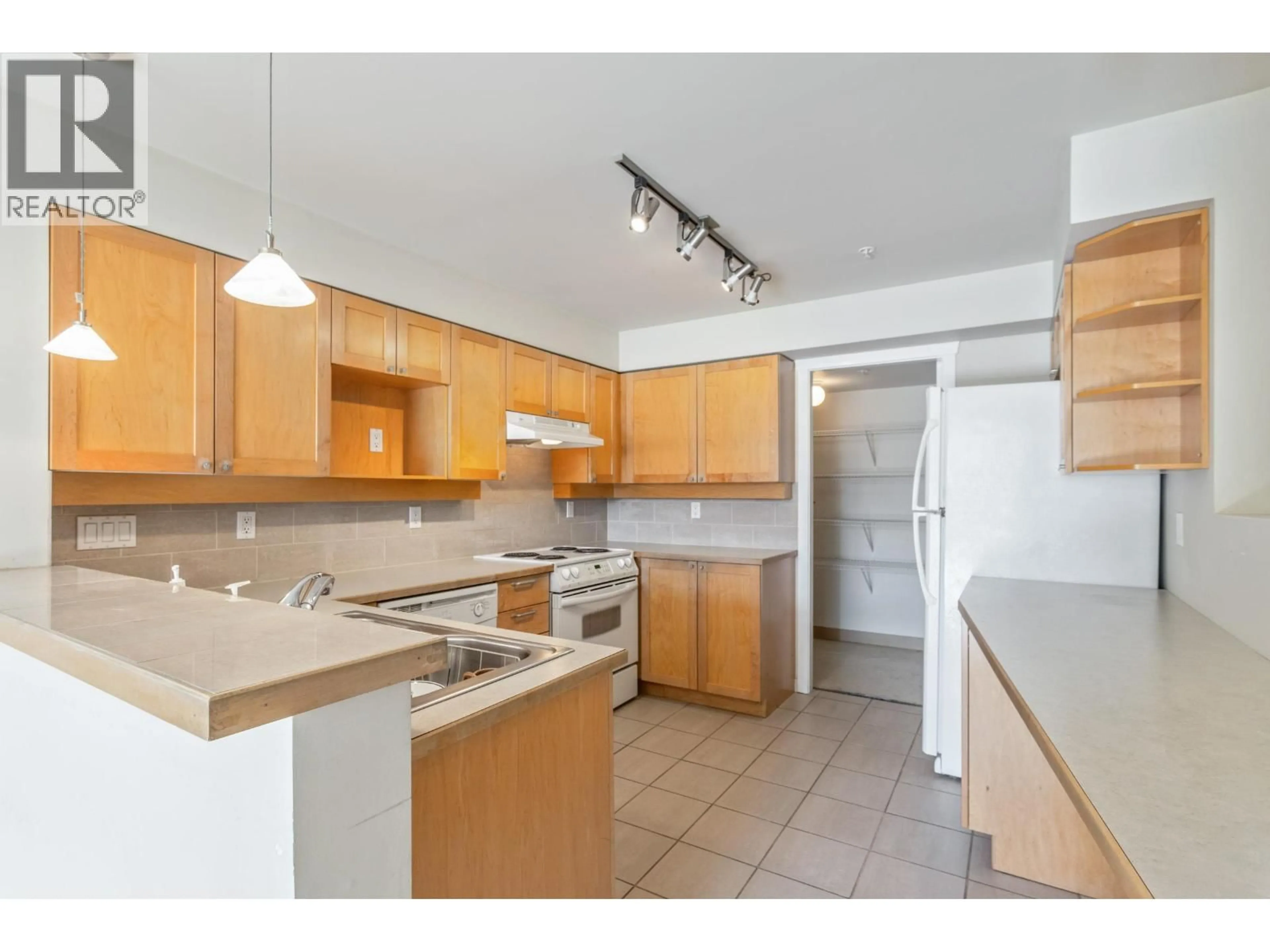 Standard kitchen, unknown for 303 - 3580 41ST AVENUE, Vancouver British Columbia V6N3E6