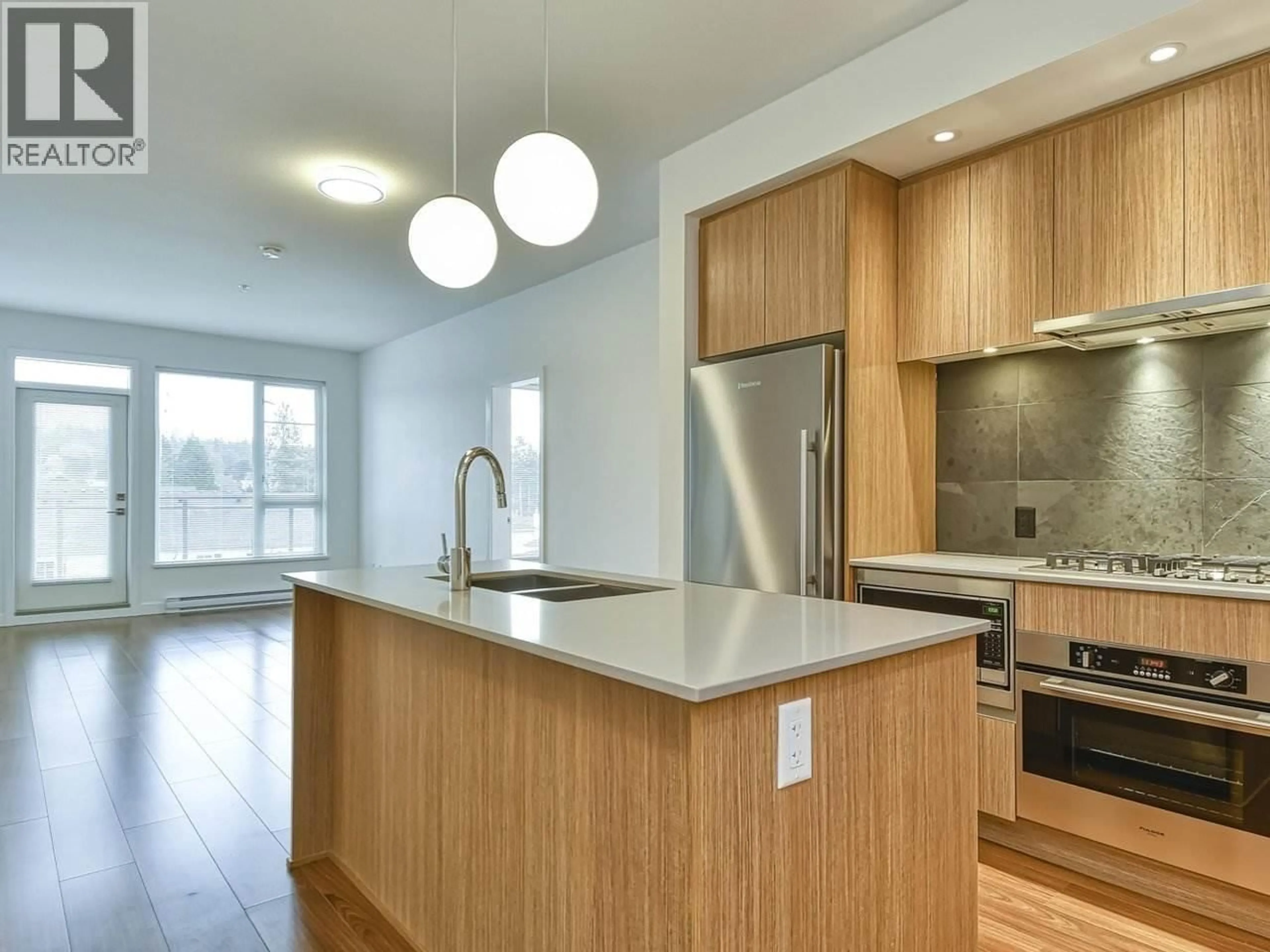 Open concept kitchen, wood/laminate floor for 503 - 516 FOSTER AVENUE, Coquitlam British Columbia V3J0H8