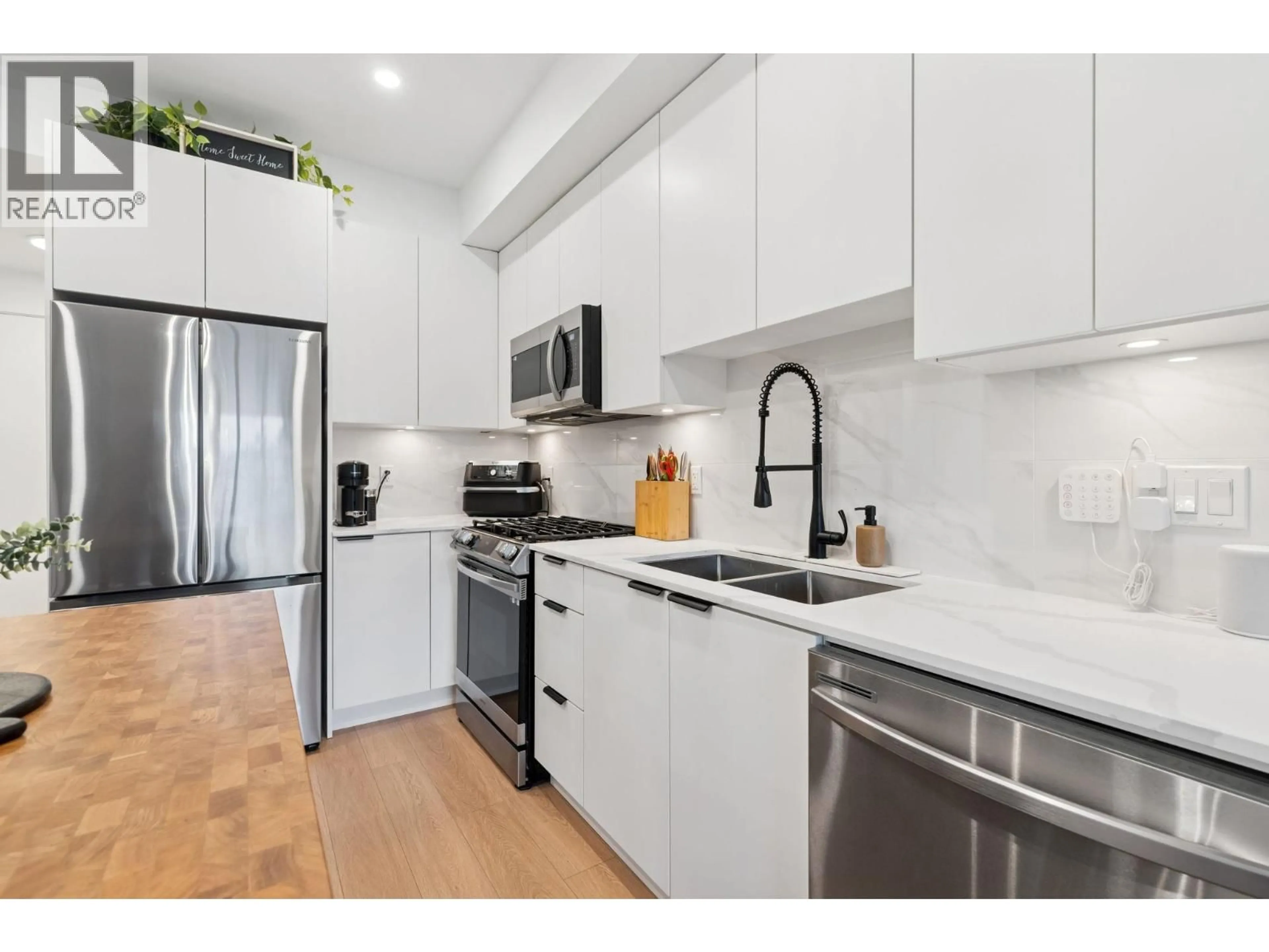 Open concept kitchen, unknown for 204 - 2331 KELLY AVENUE, Port Coquitlam British Columbia V3C1Y3