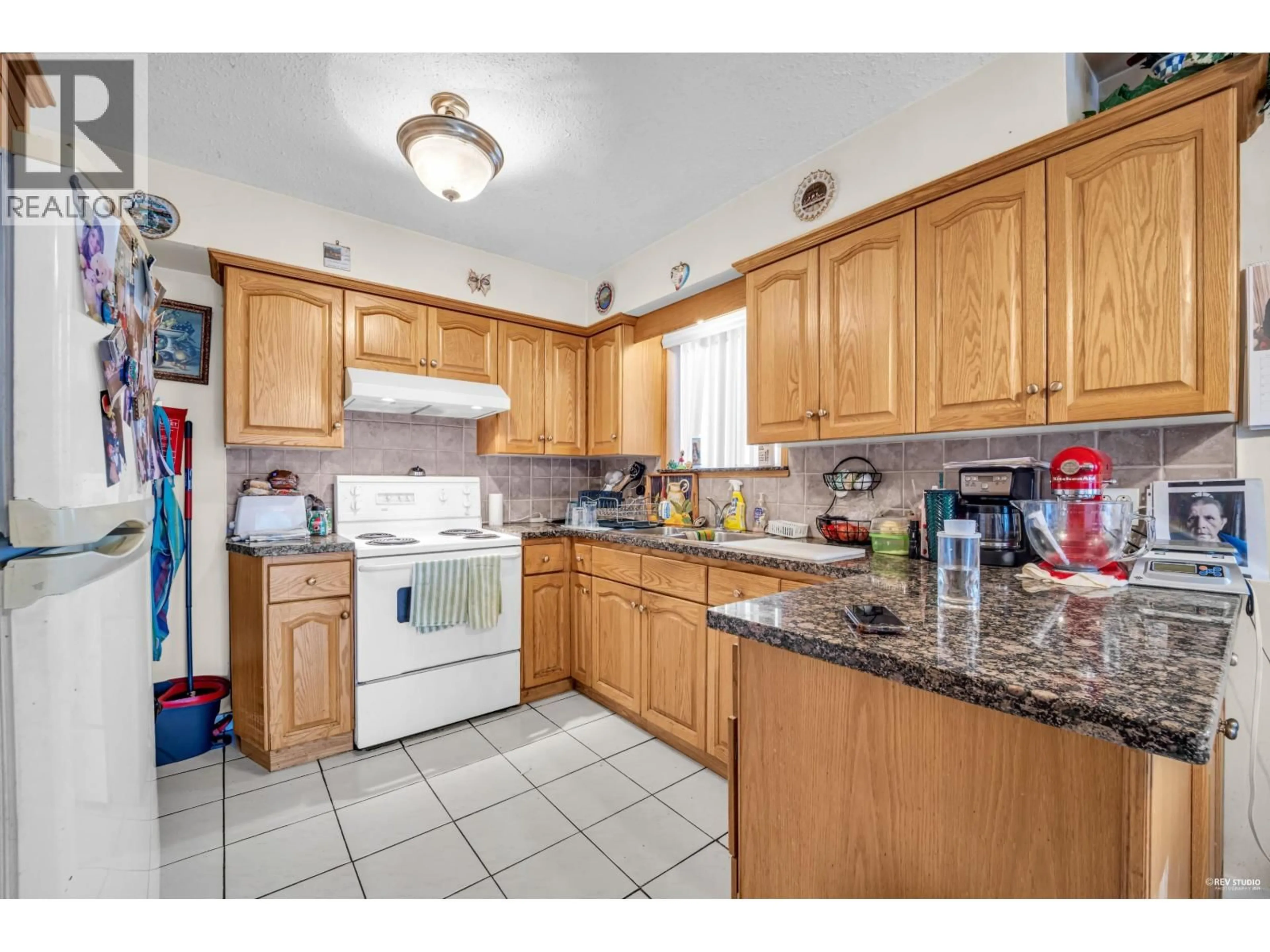 Standard kitchen, ceramic/tile floor for 4307 VENABLES STREET, Burnaby British Columbia V5C3A3