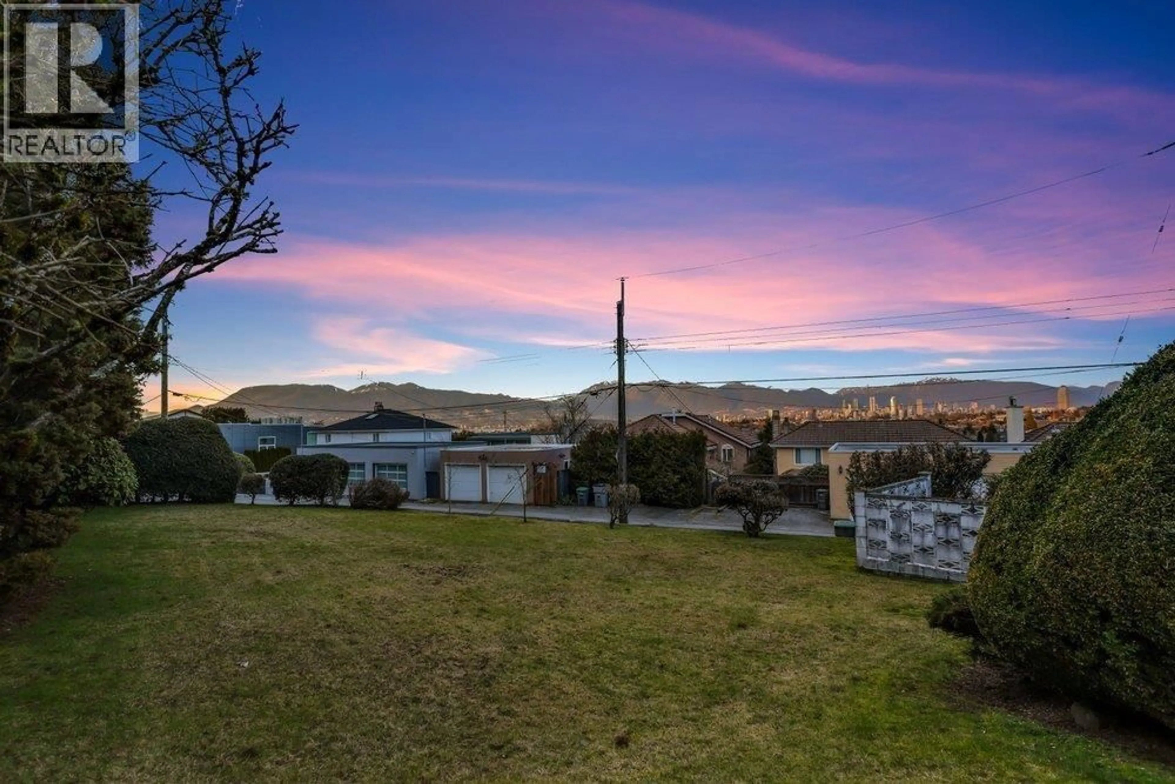 A pic from outside/outdoor area/front of a property/back of a property/a pic from drone, mountain view for 4180 QUESNEL DRIVE, Vancouver British Columbia V6L2X6