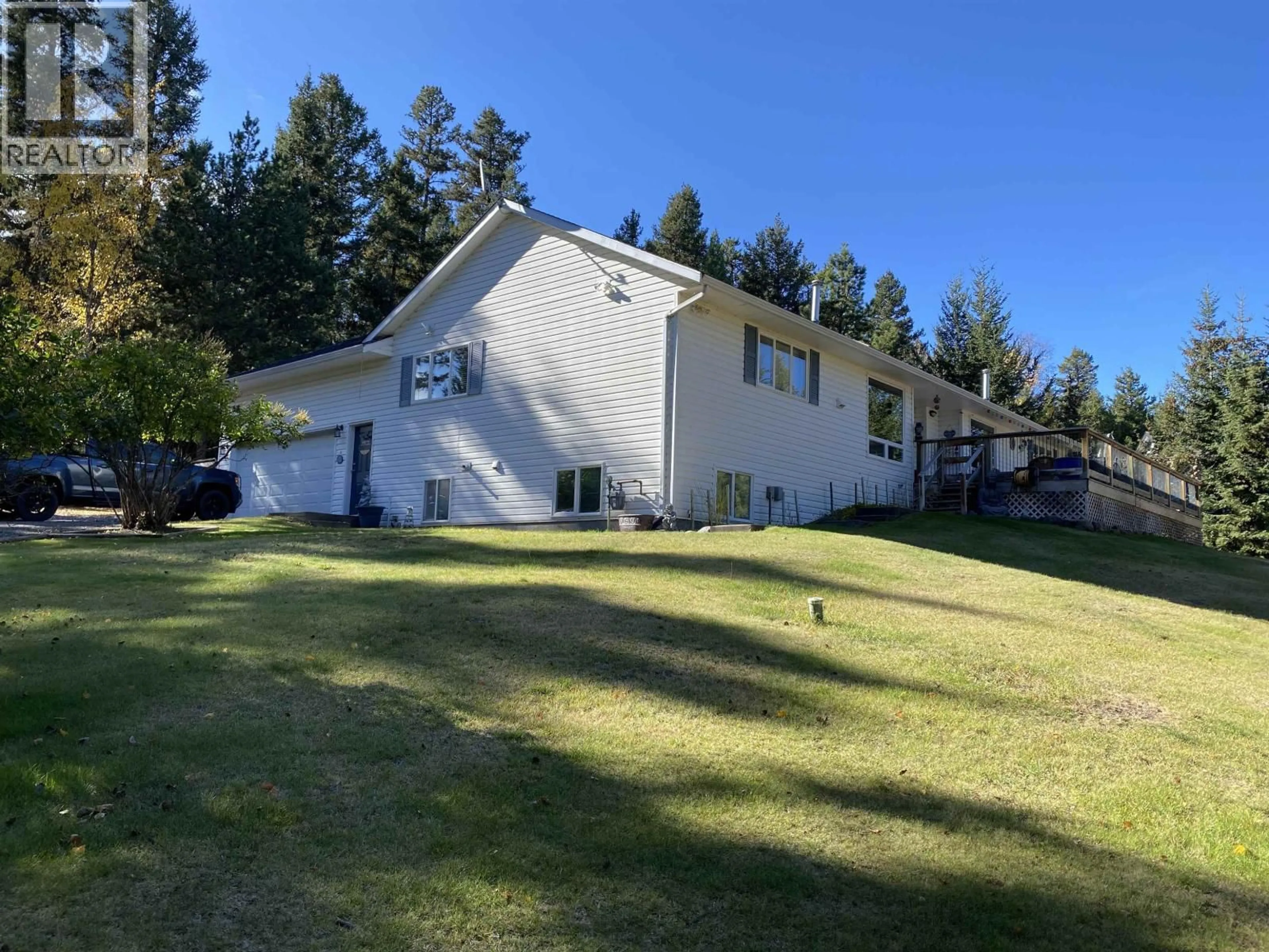 A pic from outside/outdoor area/front of a property/back of a property/a pic from drone, unknown for 5270 MACKAY CRESCENT, 108 Mile Ranch British Columbia V0K2Z0