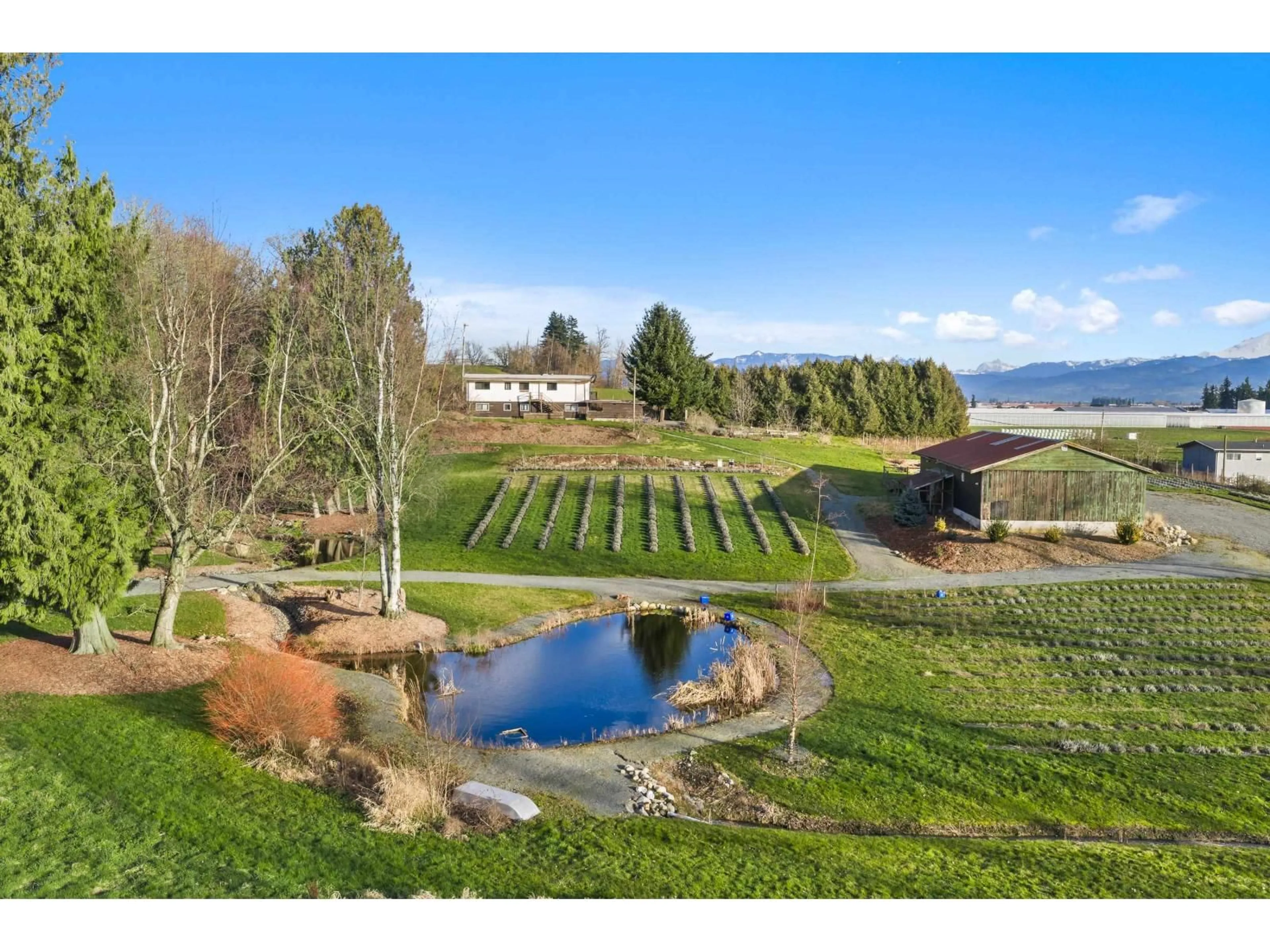 A pic from outside/outdoor area/front of a property/back of a property/a pic from drone, water/lake/river/ocean view for 681 BRADNER ROAD, Abbotsford British Columbia V4X2J5