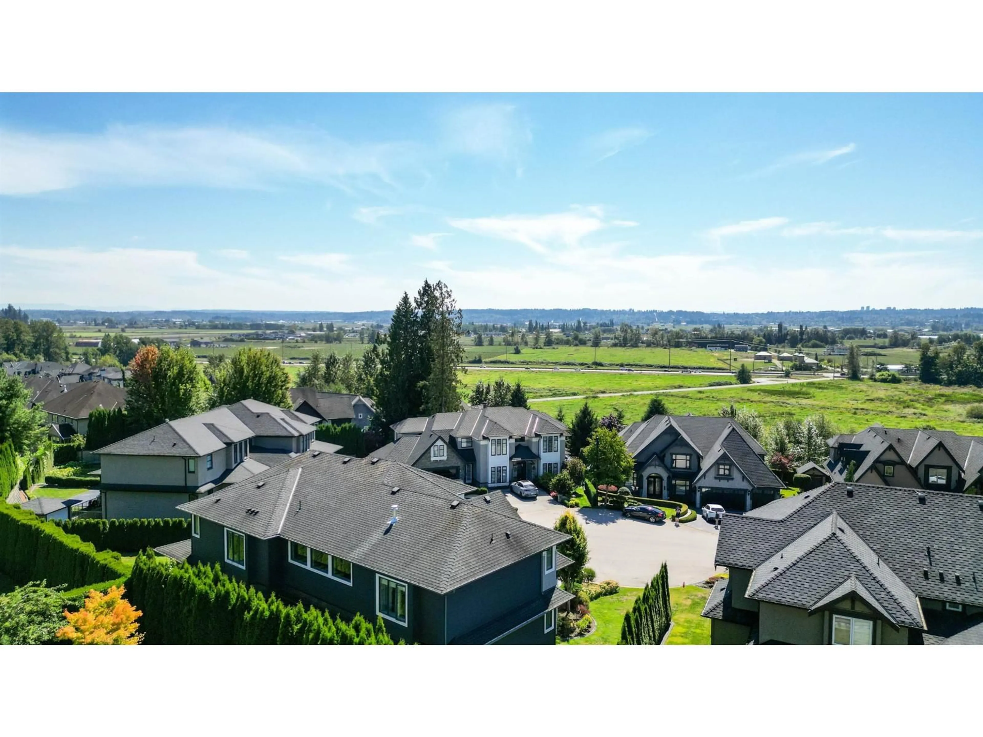 A pic from outside/outdoor area/front of a property/back of a property/a pic from drone, mountain view for 16521 58 AVENUE, Surrey British Columbia V3S6P8