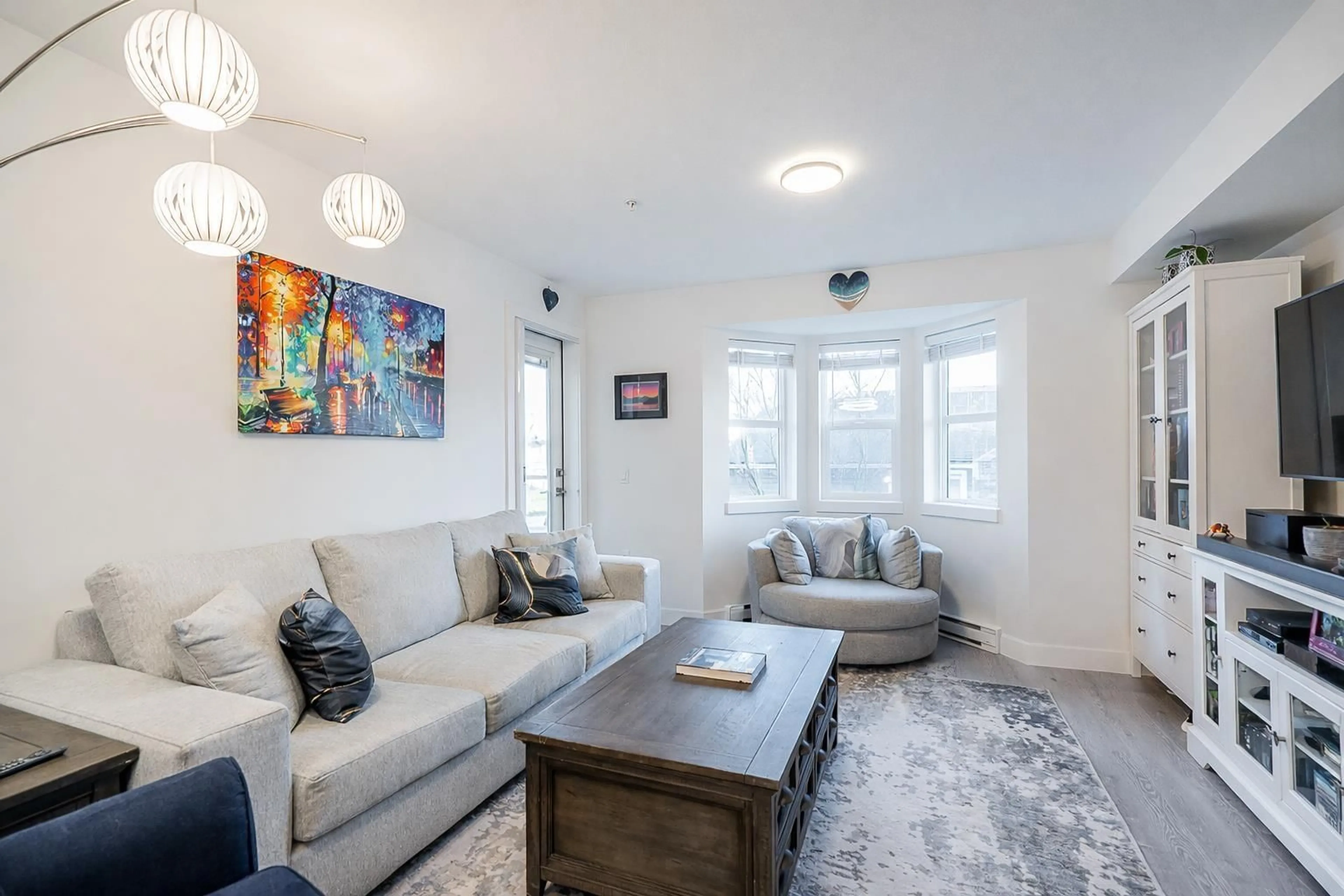 Living room with furniture, unknown for 202 - 19730 56 AVENUE, Langley British Columbia V3A3X6