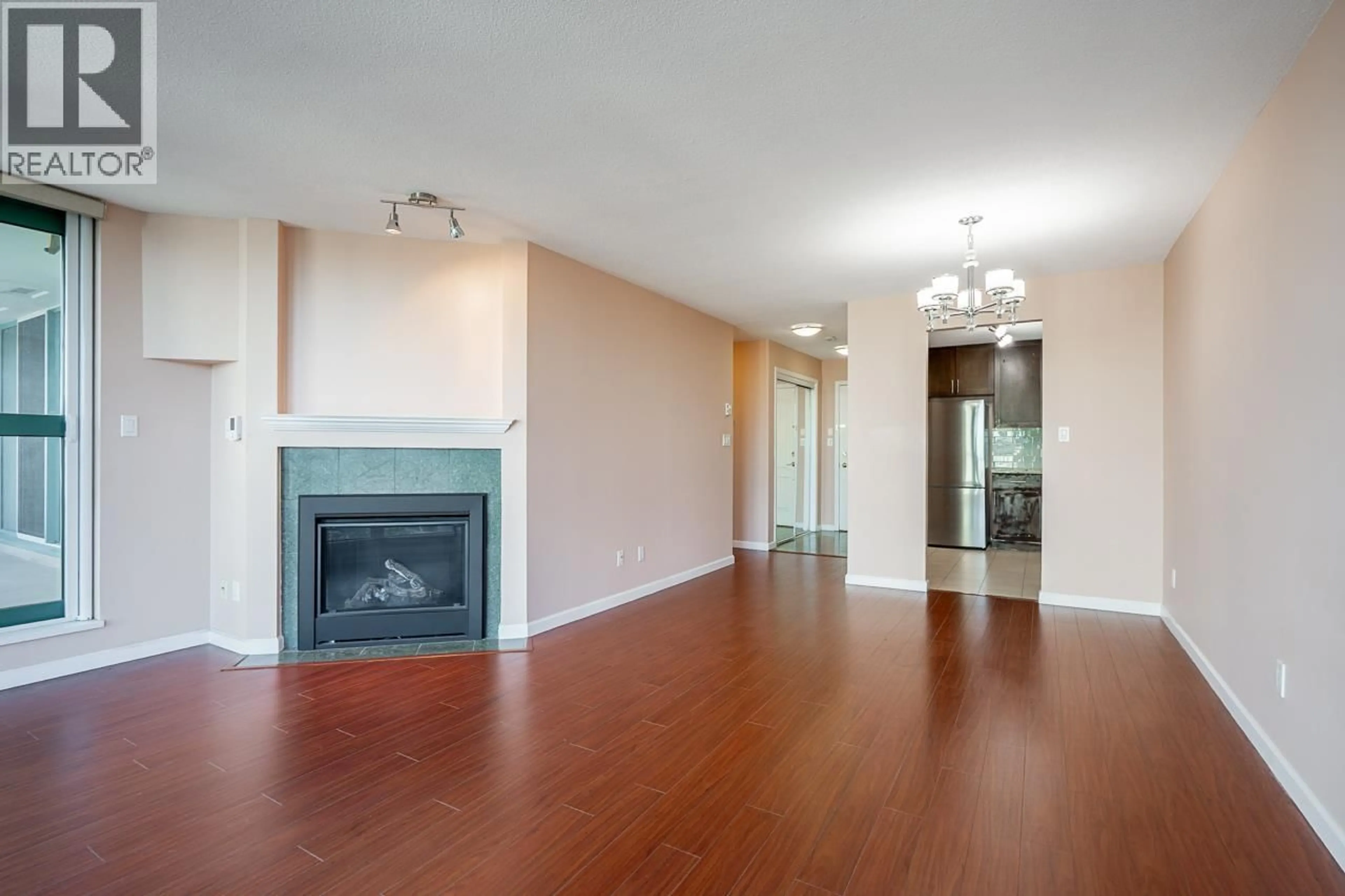 Living room with furniture, wood/laminate floor for 1505 - 5899 WILSON AVENUE, Burnaby British Columbia V5H4R9