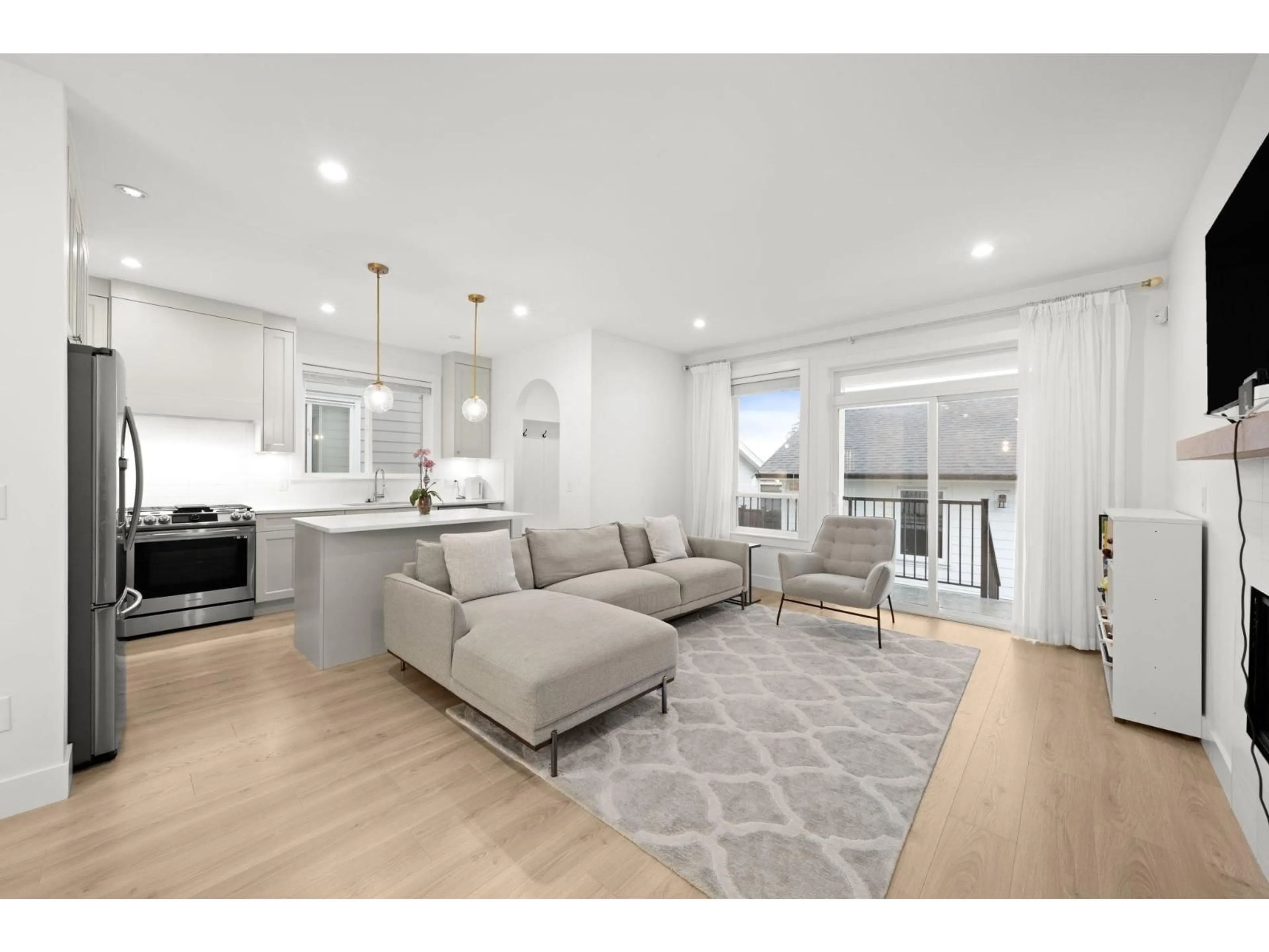 Living room with furniture, wood/laminate floor for 16782 21A AVENUE, Surrey British Columbia V3Z0M3