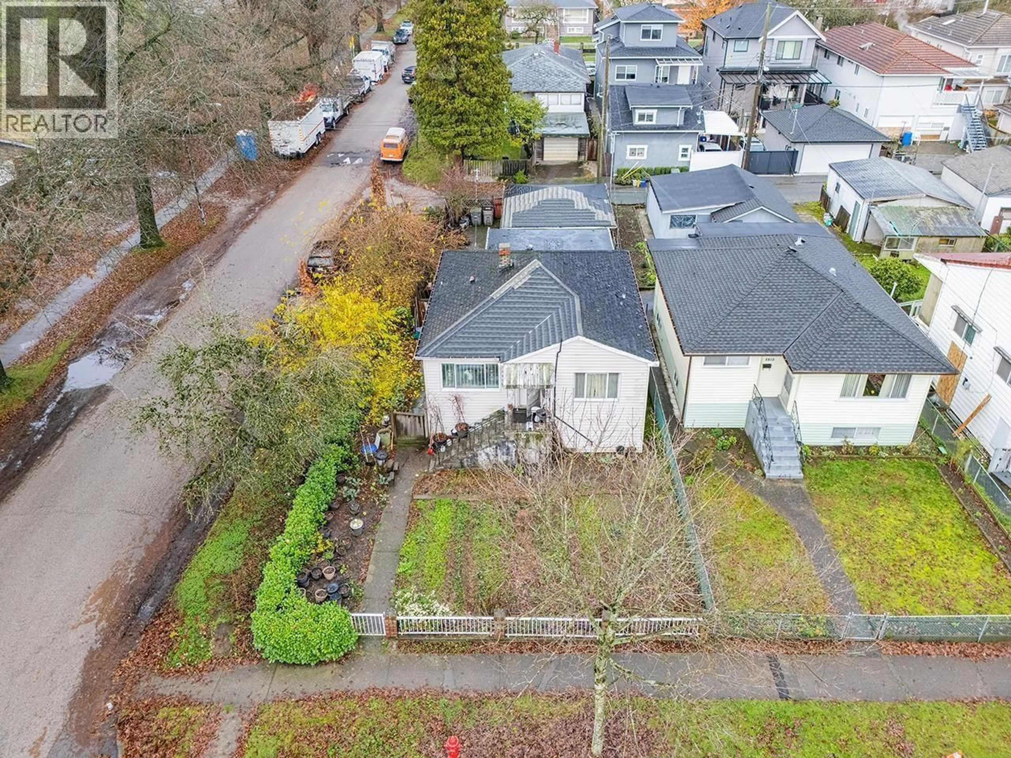 A pic from outside/outdoor area/front of a property/back of a property/a pic from drone, street for 1805 51ST AVENUE, Vancouver British Columbia V5P1W1
