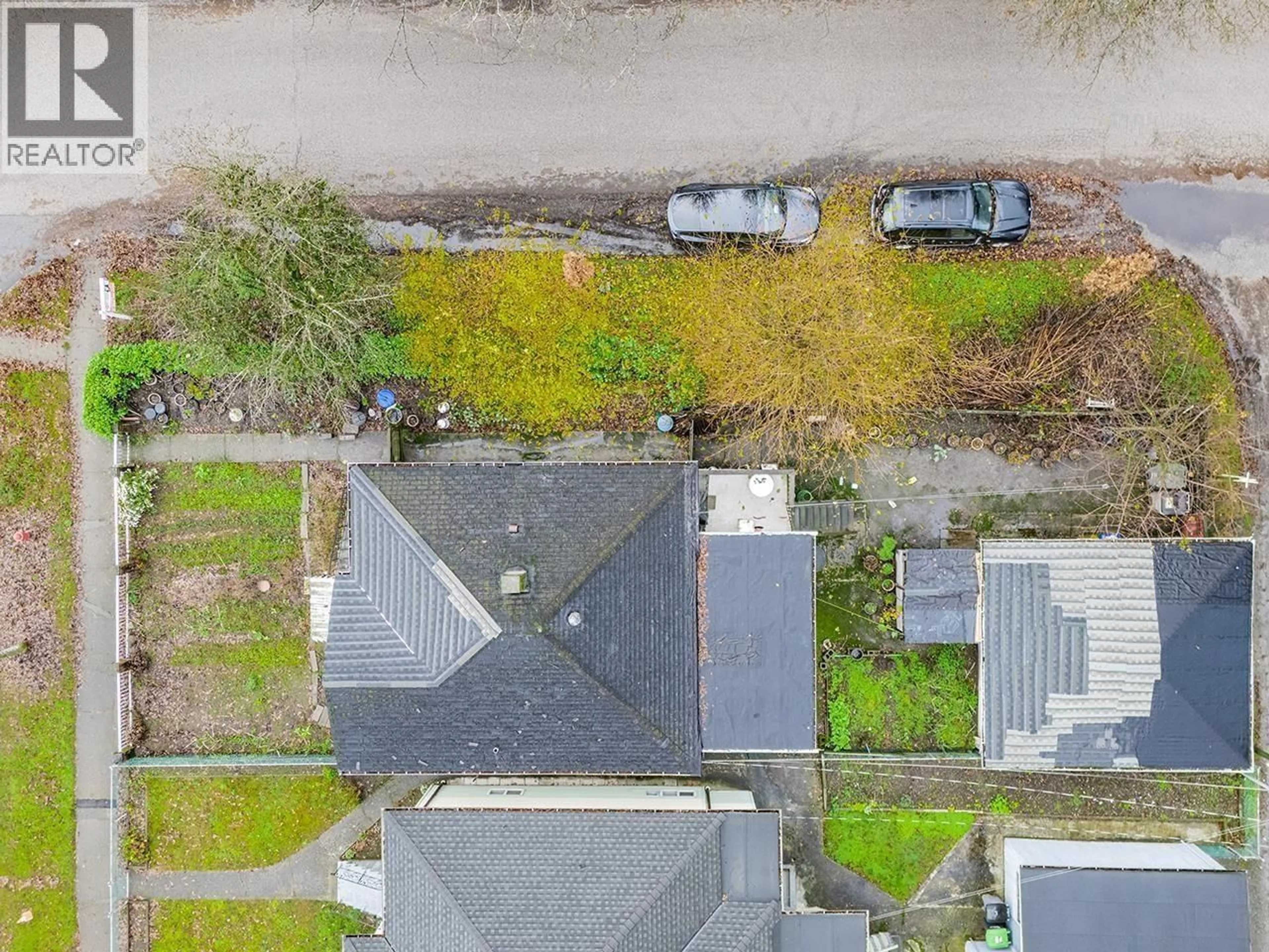 A pic from outside/outdoor area/front of a property/back of a property/a pic from drone, street for 1805 51ST AVENUE, Vancouver British Columbia V5P1W1