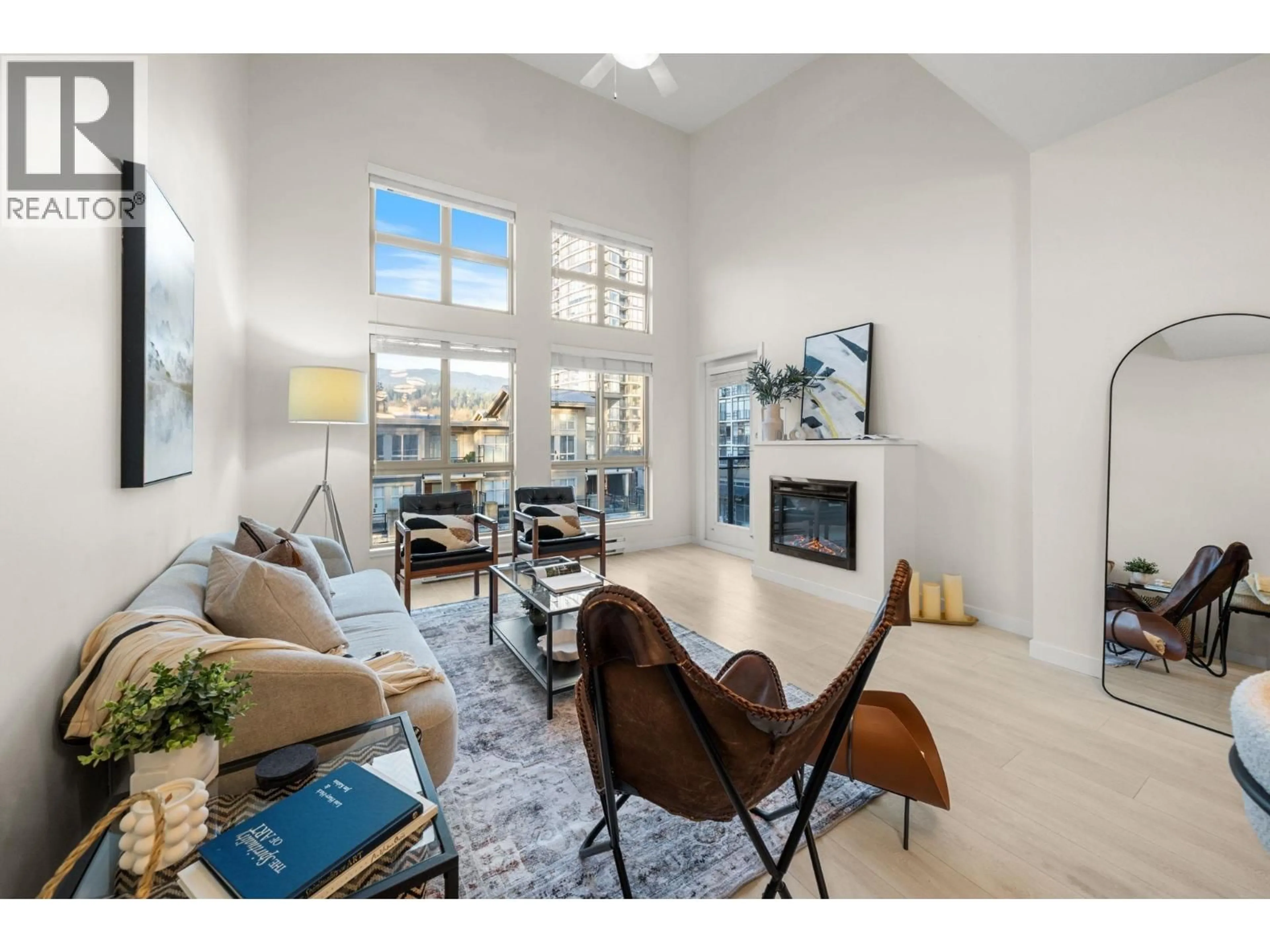 Living room with furniture, unknown for 407 - 201 MORRISSEY ROAD, Port Moody British Columbia V3H0E5